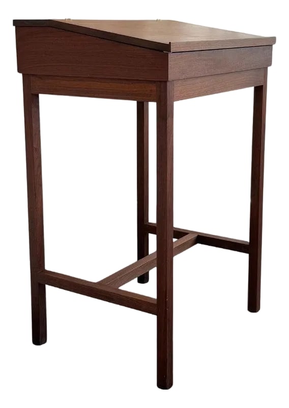Late 20th Century Mid-Century Modern Custom-Made Walnut Standing Flip Top Desk: This mid-century modern teak flip-top secretary desk is a wonderful tall station to work at either standing or with a stool. It is a custom-made desk circa 1970s that features a minimal design with cl