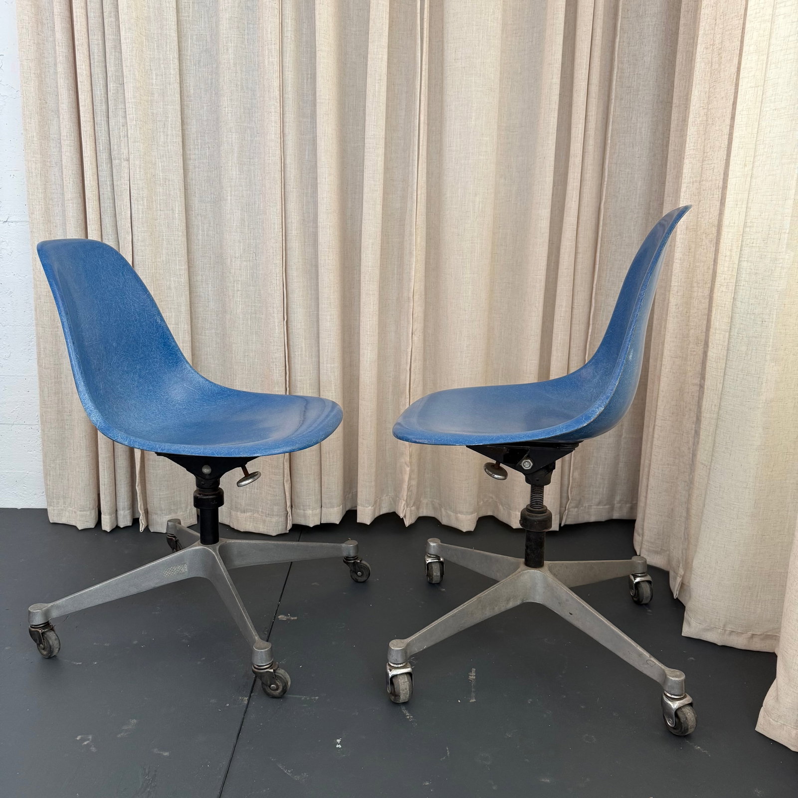 Pair of Eames for Herman Miller Blue Fiberglass Rolling Chairs - 3