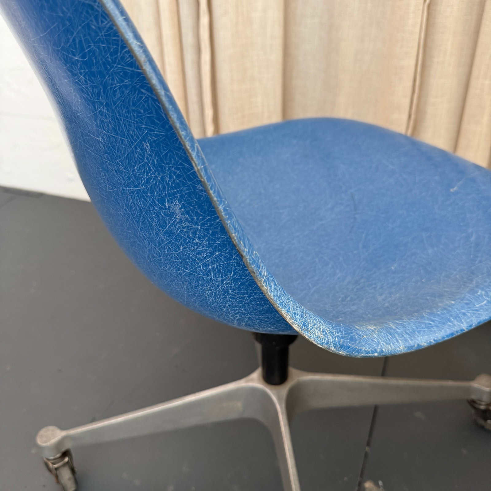 Pair of Eames for Herman Miller Blue Fiberglass Rolling Chairs - 7