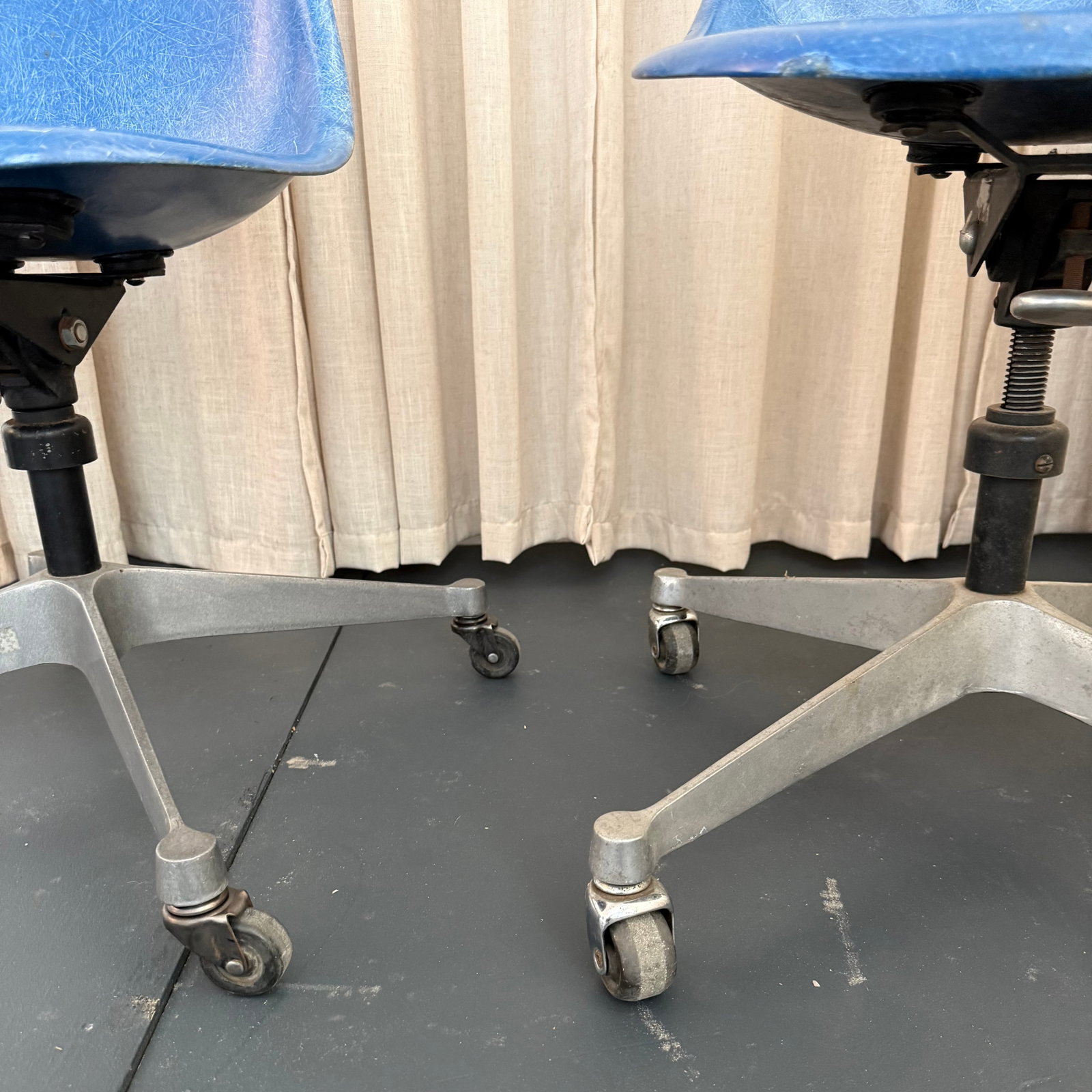Pair of Eames for Herman Miller Blue Fiberglass Rolling Chairs - 8