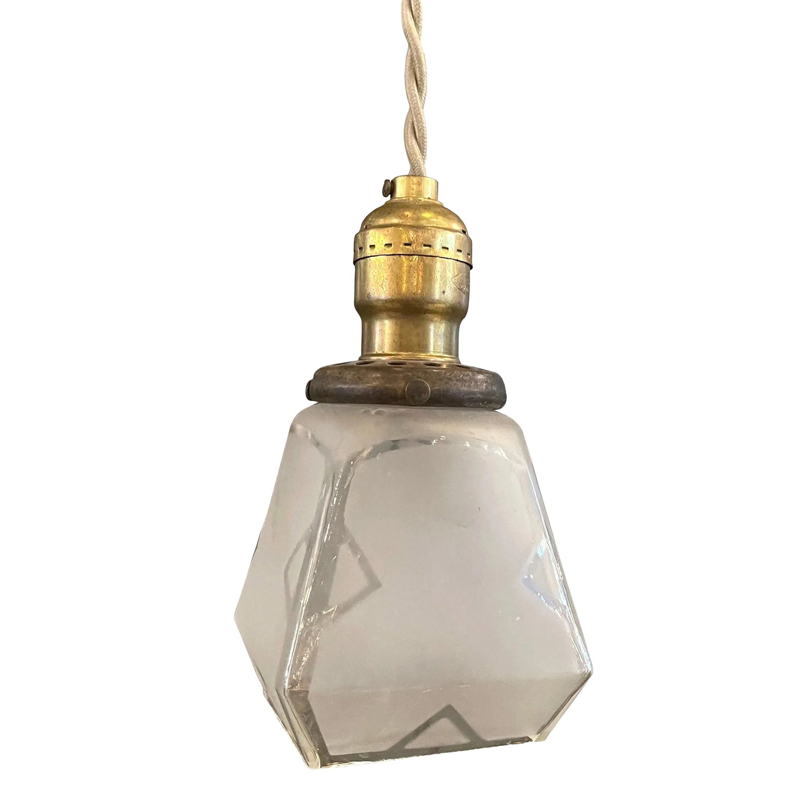 Mid 20th Century Arts & Crafts Faceted Frosted Glass Pendant Light: Petite, arts and crafts, pendant light with faceted, clear and frosted glass shade and brass pull chain hardware is newly wired with beige barided cloth cord to hang at 77 inches overall length.