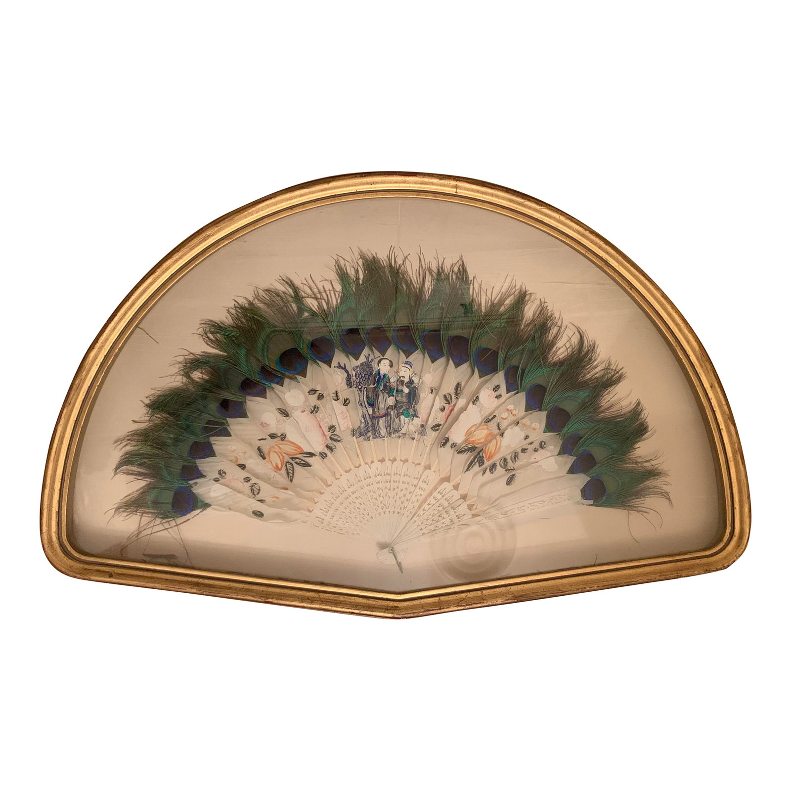 Early 20th Century Chinese Painted Fan: Chinese painted feather fan. Painted with a bearded man and woman flanked by solitary tree, and enclosed by bold, naive flowers and leaves. Mounted in a fan shaped glazed and gilded wood frame.