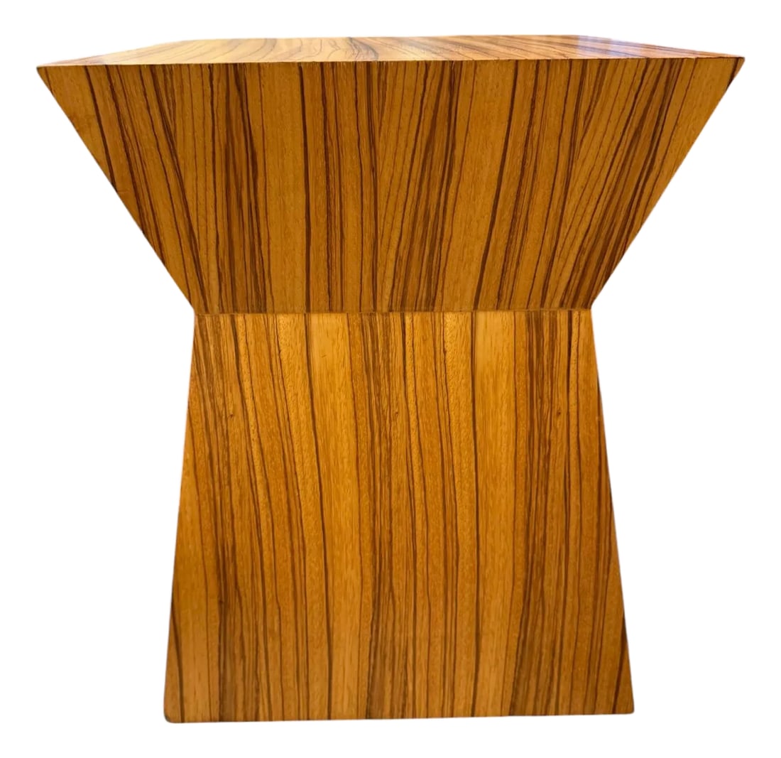 Christian Liaigre Attributed Nagato Side Table by Gus: Quick Hits: Christian Liaigre attributed Nagato side table, labeled by Gus Design Group Striking sculptural silhouette with a wood-grain veneer finish Modern, minimalist, and unmistakably high-end