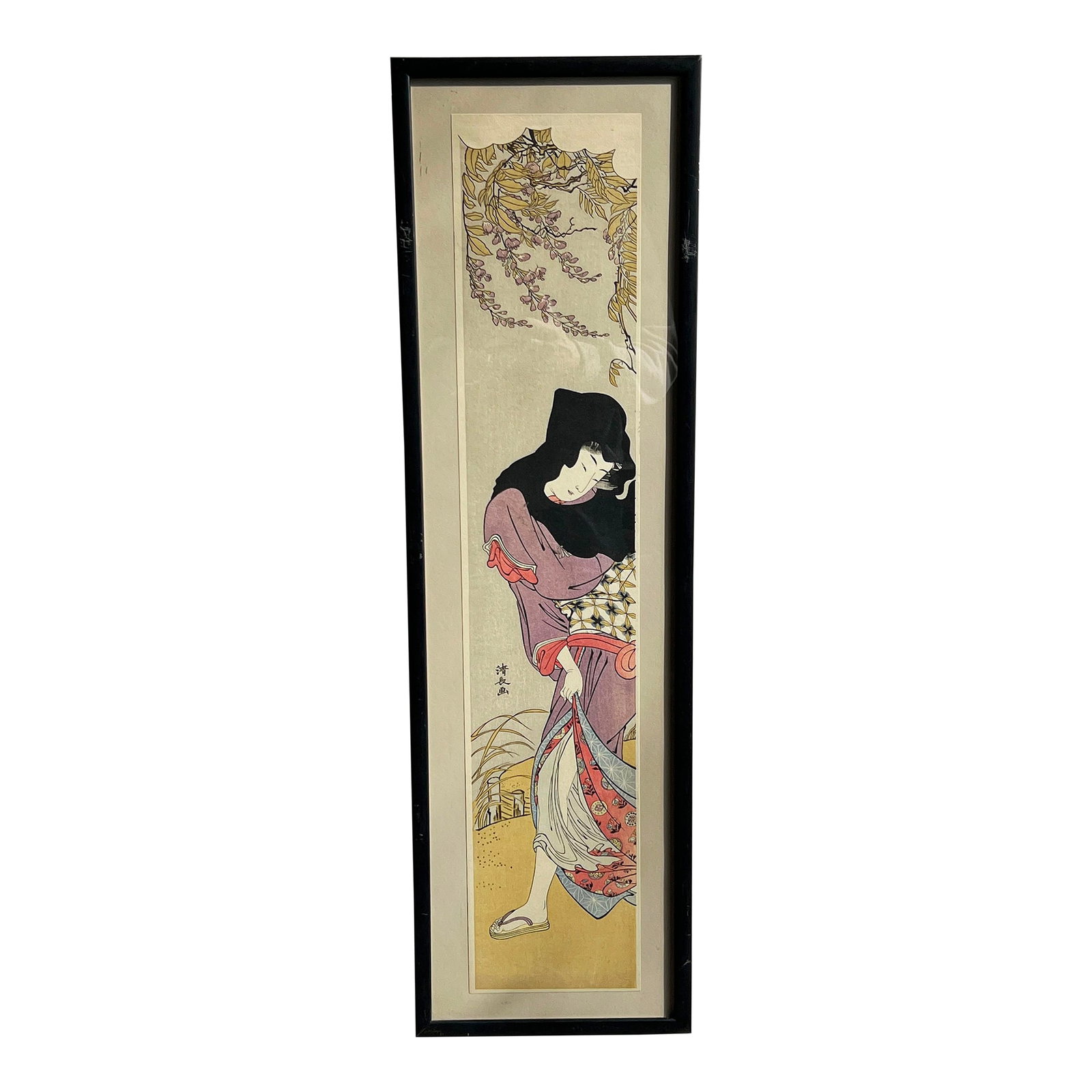 Vintage Japanese Woodblock Print 'Beauty Walking Under Windblown Wisteria' by Torii Kiyonaga: This elegant woodblock print features a graceful woman walking against the wind, delicately pulling her kimono as cascading wisteria sways above. Originally created by Torii Kiyonaga (1752–1815)