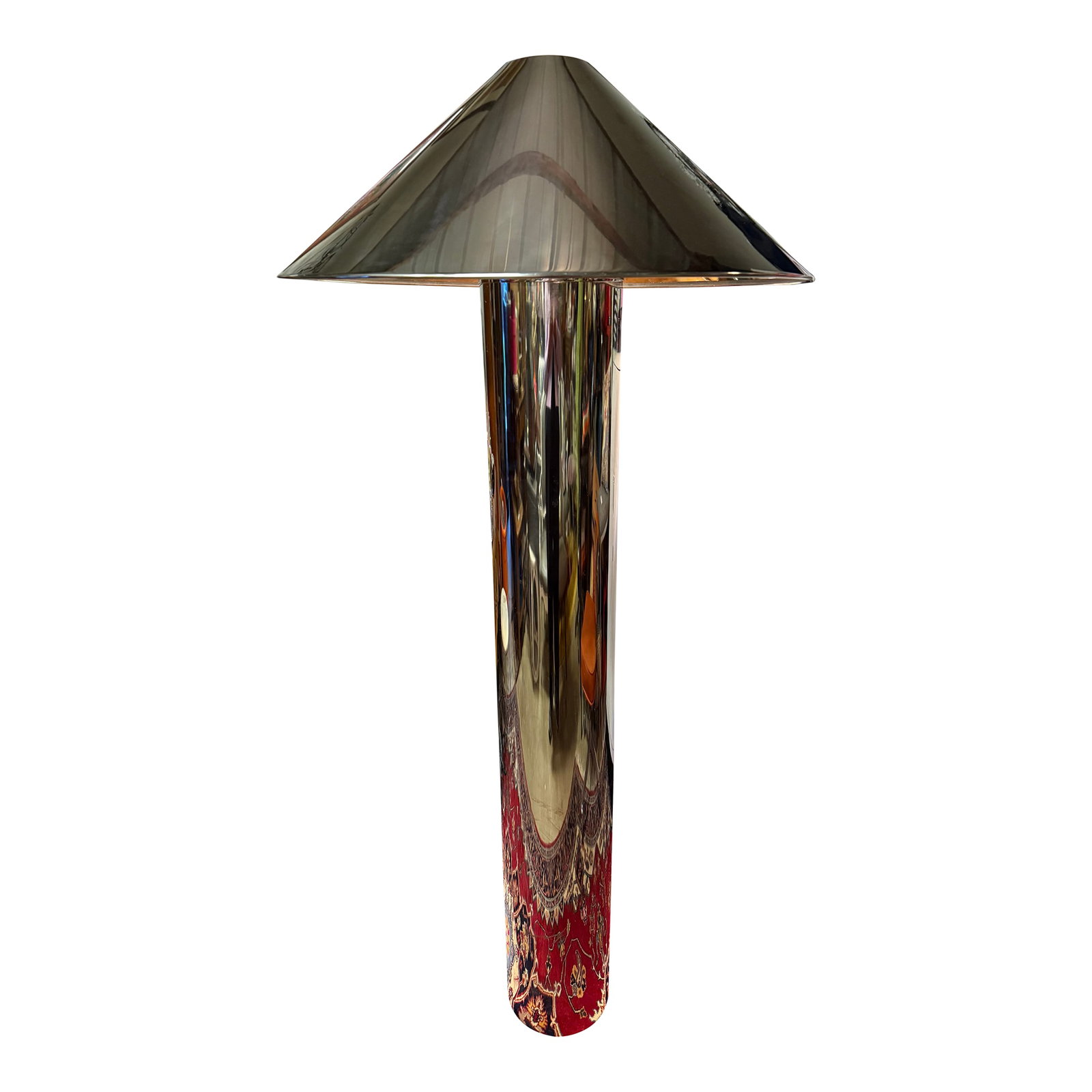 Contemporary CB2 Minimalist Cool Chrome Floor Lamp: This architectural floor lamp is most likely the Gigi Polished Stainless Steel Floor Lamp, designed by VUUE for CB2. It is characterized by its sleek, oversized cylindrical base and a minimalist