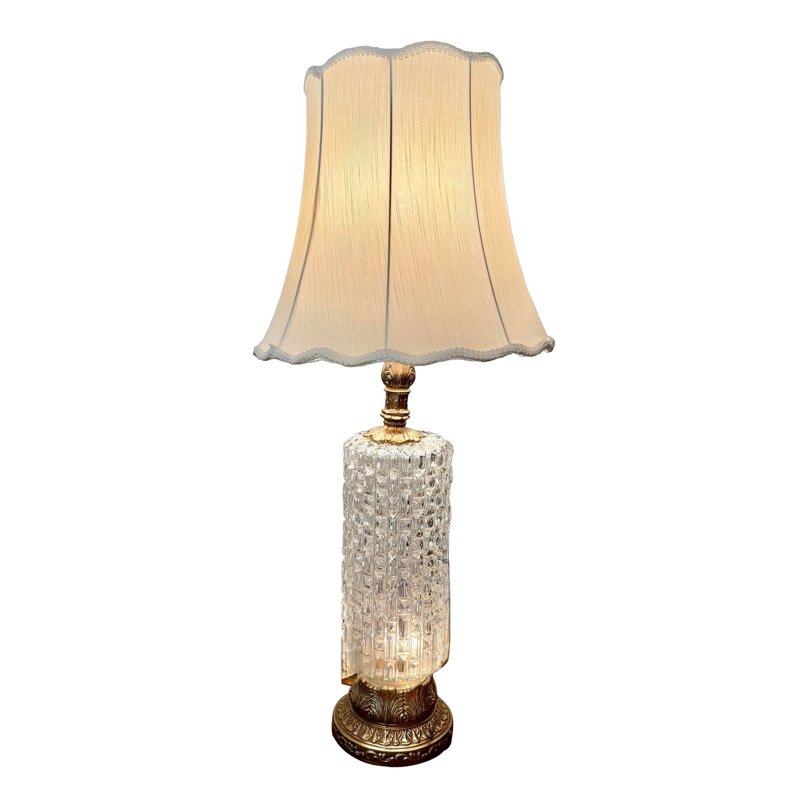 Murano Glass Lamp With Brass Base: This lamp combines the artistry of Italian design with functional lighting, providing both ambient illumination and a sophisticated decorative element to any space. Its design reflects the aesthetic