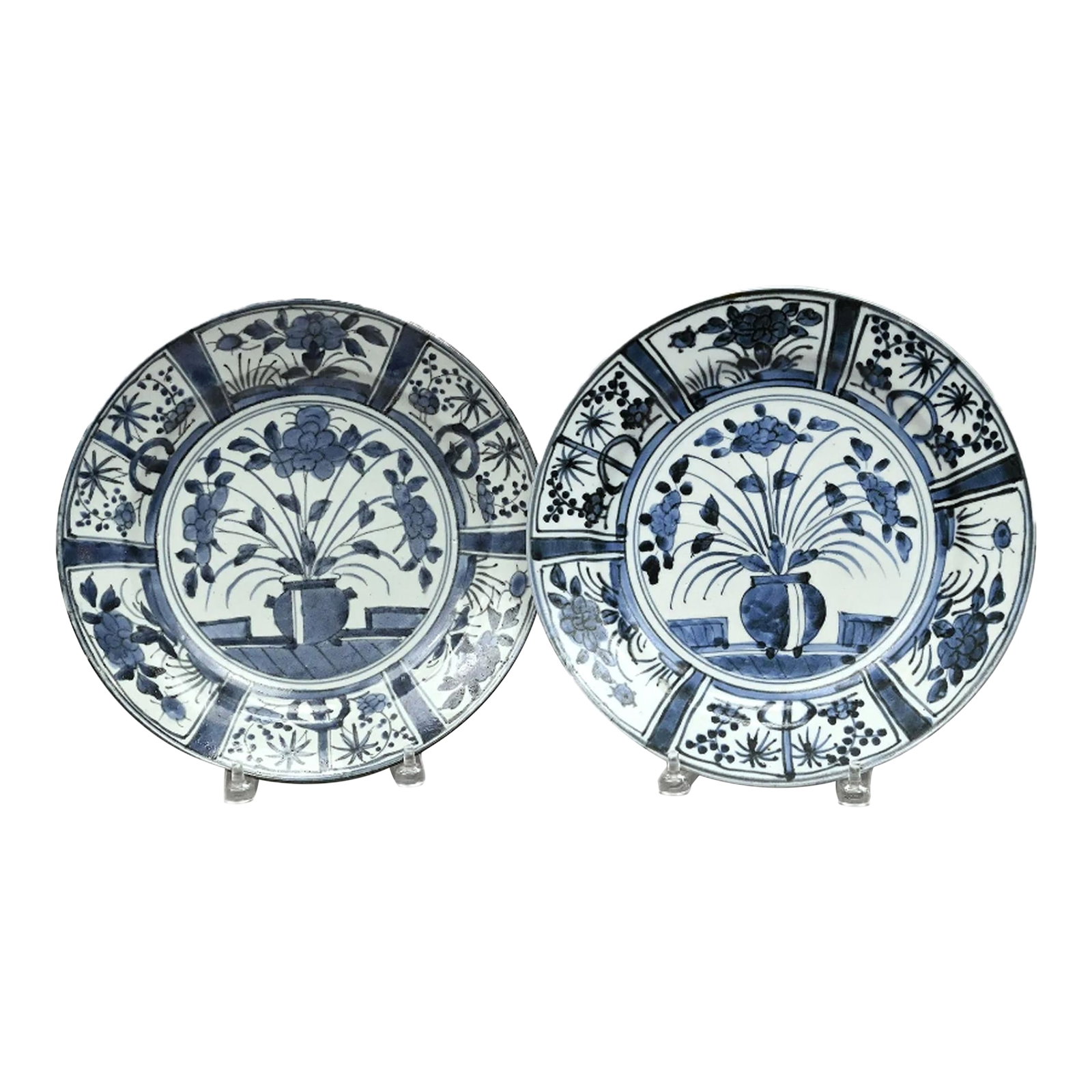 17tth-Century Japanese Porcelain Blue & White Kraak-Style Dishes: Edo Elegance: Pair of Japanese Arita 'Kraak Style' Porcelain Dishes Edo Period, Circa 1680–1700 This spectacular pair of Japanese Arita porcelain blue and white dishes is a classic example of