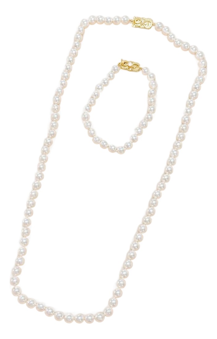 Mikimoto Akoya Pearl Necklace & Bracelet: Mikimoto 32" Akoya Pearl Necklace ranging from 6.25mm to 7.00mm. Breaks into 24" Necklace and 7 1/2" Bracelet Two 18k yellow gold clasps with Mikimoto Hallmarks Condition: Alterations: Original