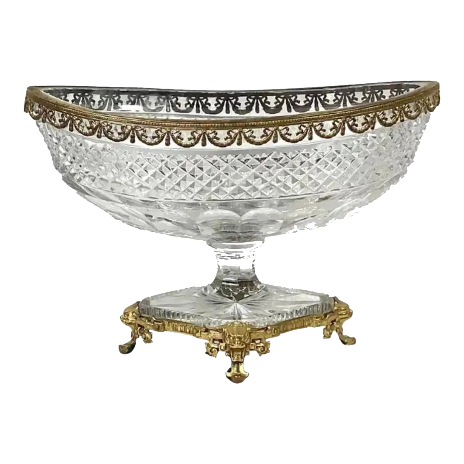 Bronze Dore Mounted Crystal Baccarat Style Centerpiece: Exquisite Dore bronze and diamond cut crystal oval centerpiece in the style of Baccarat. Crystal bowl and pedestal stand on gilt bronze lion paw feet. Attributed to Baccarat. Condition: Alterations: O