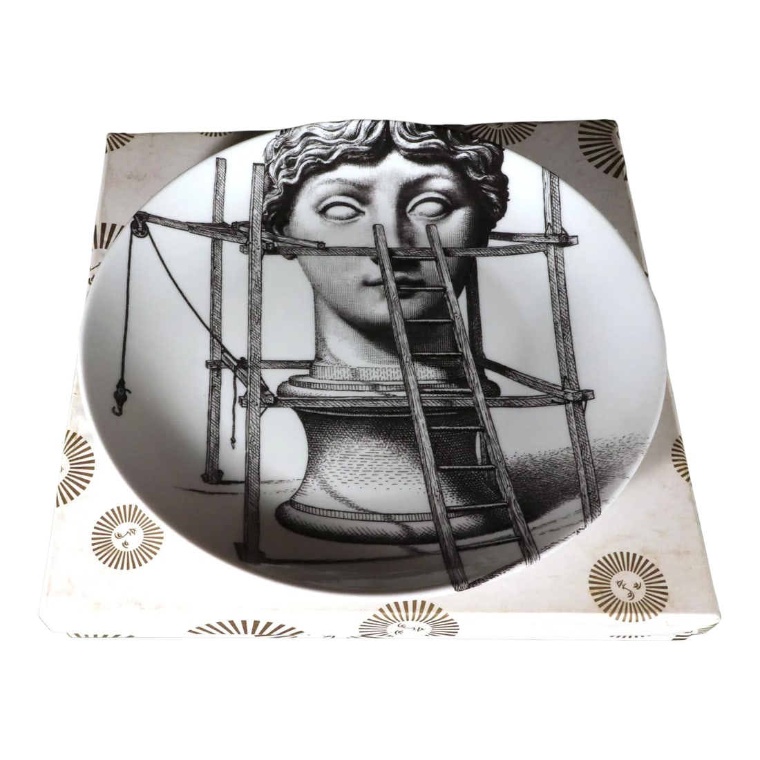 Fornasetti Themes & Variation Porcelain Plate, Number 200: Fornasetti Themes & Variation Porcelain Plate with Original White Box, Number 200, The Statue, 1990s The Fornasetti porcelain plate is number 200 in the Themes & Variation series. The image shows a