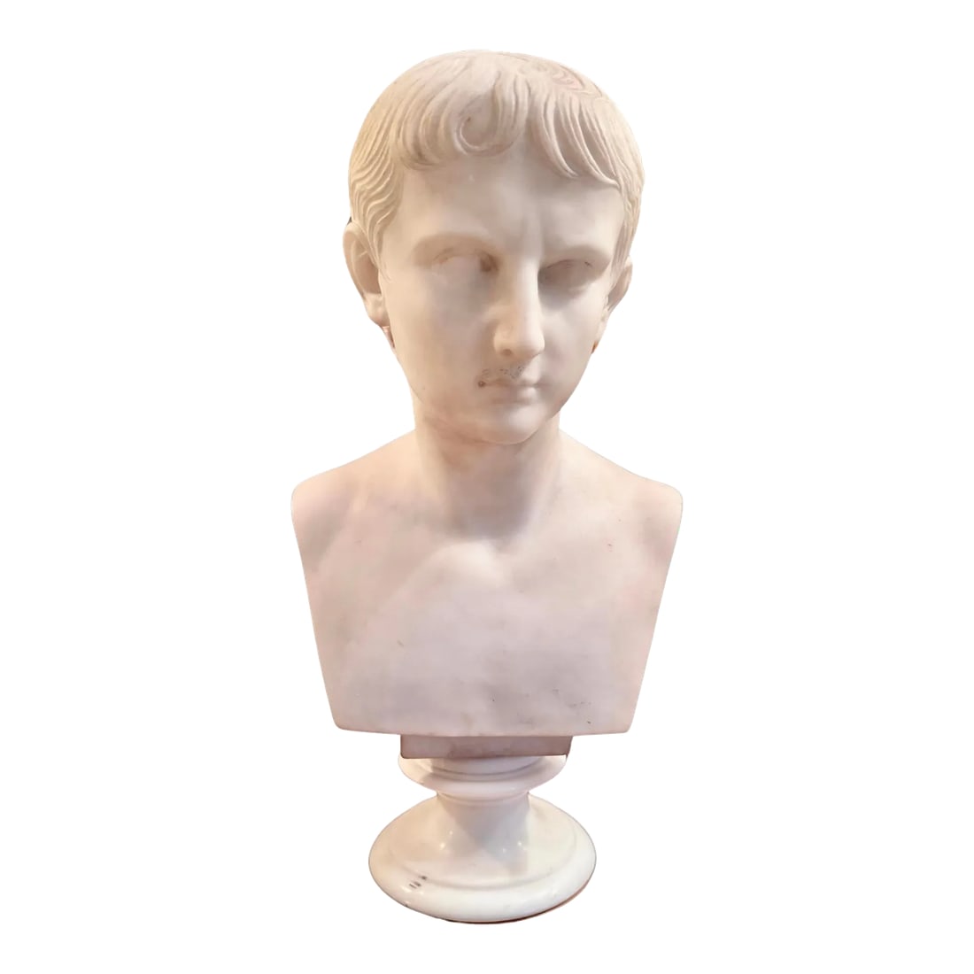 Italian Grand Tour White Marble Bust of Augustus Caesar: 19th century Italian Grand Tour white marble bust of Augustus Caesar. Bust sits on a round white marble pedestal base. Augustus was Julius Caesar's great-nephew, and the first Roman emperor following 