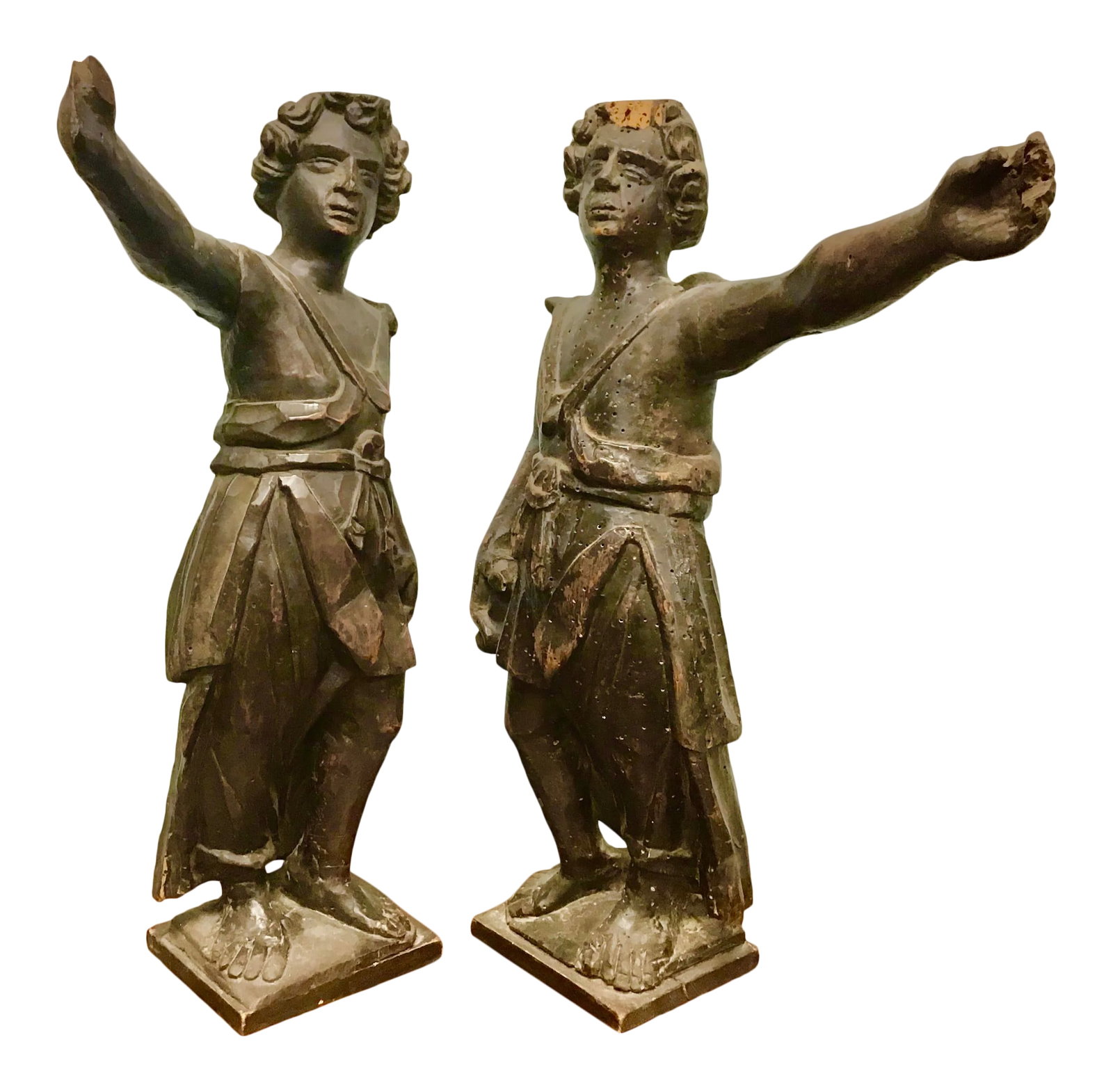 18th Century Italian Carved Wood Sculptures - a Pair: Beautiful pair of antique carved figurines. Italian, circa 1780, the tall sculptures depict two men, probably soldiers, in flowing robes with one arm out stretched. The elegant figures are in