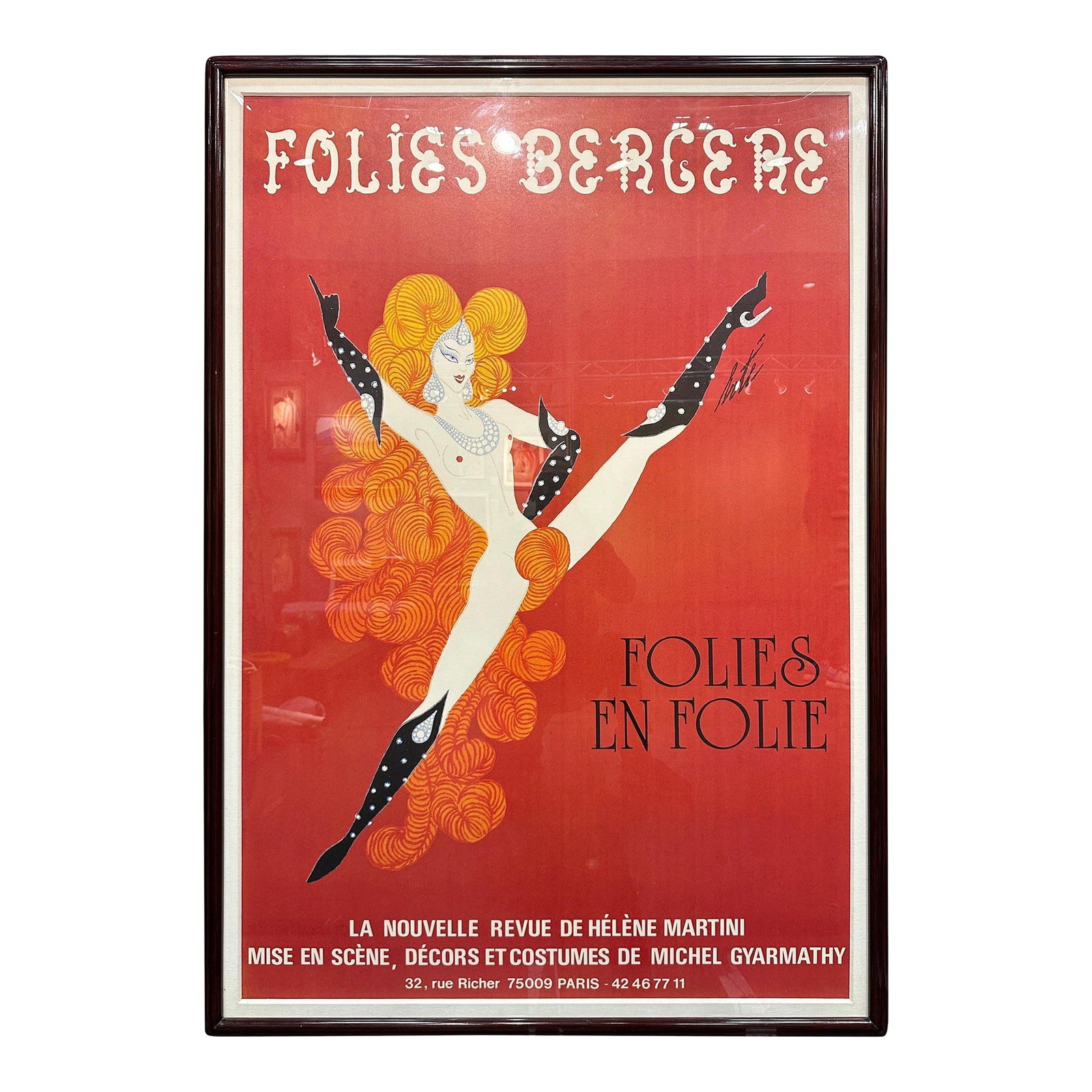 Folis Bergere Poster by ERTE: Cabaret Folis Bergere advertising framed poster designed by ERTE. Poster is linen backed and protected behind acrylic sheet. Comes with certificate of authenticity. Condition: Alterations: Unknown
