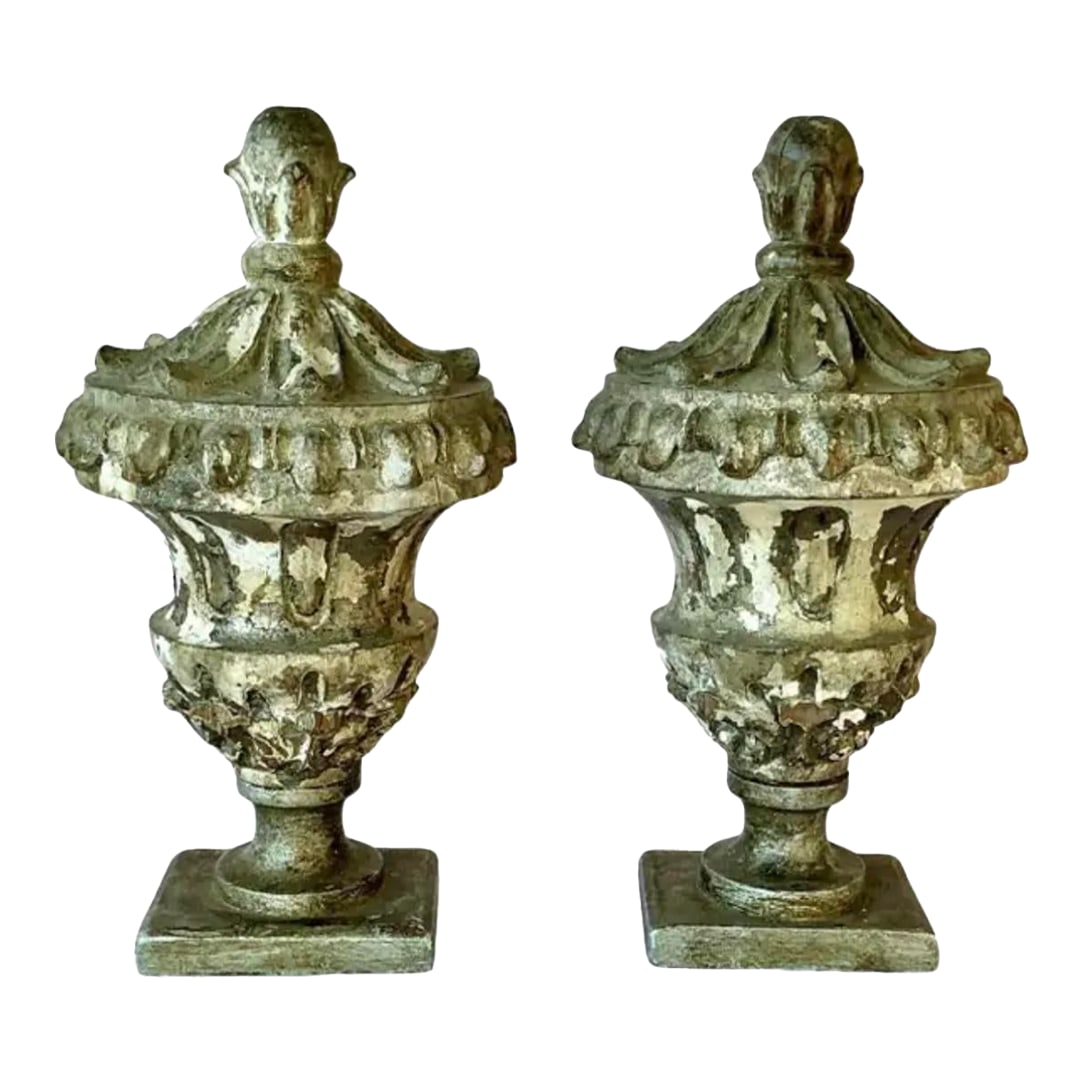 19th Century Italian Neoclassical Wooden Urns/Finials, a Pair: Pair of 19th Century Italian Neoclassical Decorative Urns/Finials. The urns/finials exemplify the restrained grandeur and classical symmetry characteristic of the period. Hand-carved from wood, each u