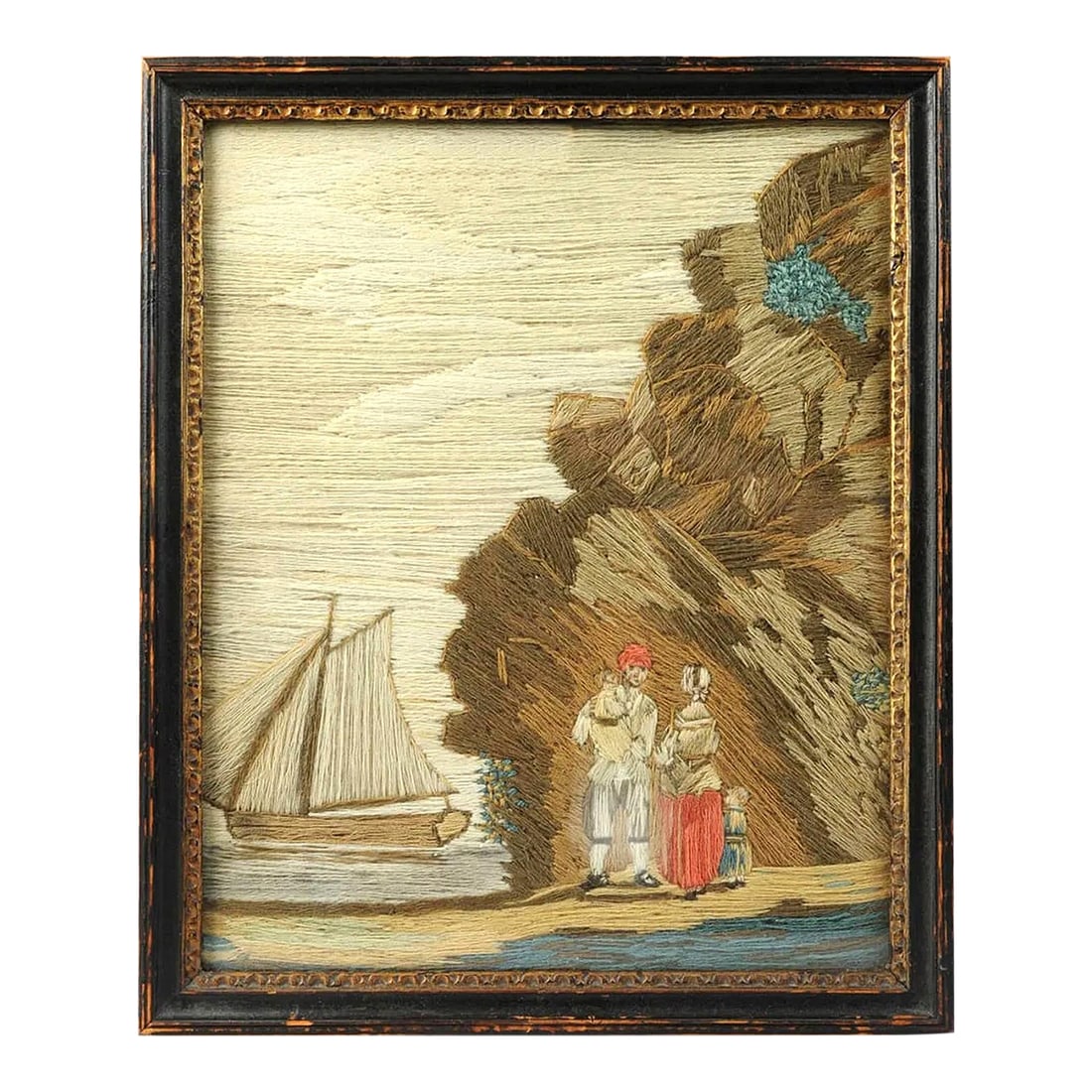 British Woolwork of a Family of Man, Wife and Child on the Seashore With Ship in Bay: The Sailor's Glimpse: Woolwork of a Family Object: Rectangular Woolwork Picture Origin: British (Sailor's Folk Art) Date: Circa 1860 Medium: Wool, Silk Thread on Fabric Ground, Framed Dimensions: 15