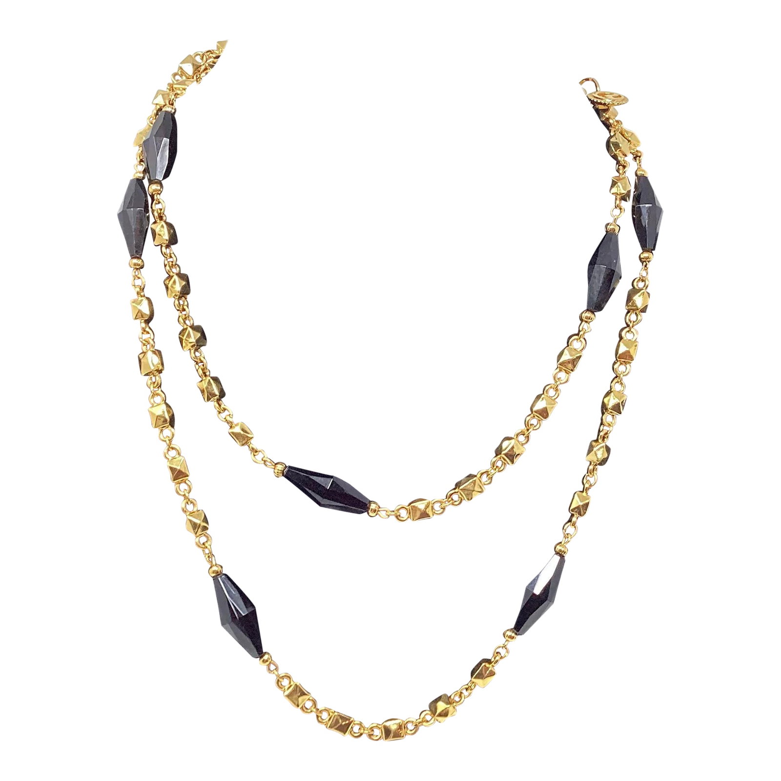 1980s St. John Opera Length 42" Gold Plated & Black Faceted Bead Necklace: Stunning Vintage St John Opera Length (42") Gold Plated and Black Faceted Bead Necklace. St John Logo Charm is Attached to Chain. Like New Condition. Condition: Alterations: Original Condition