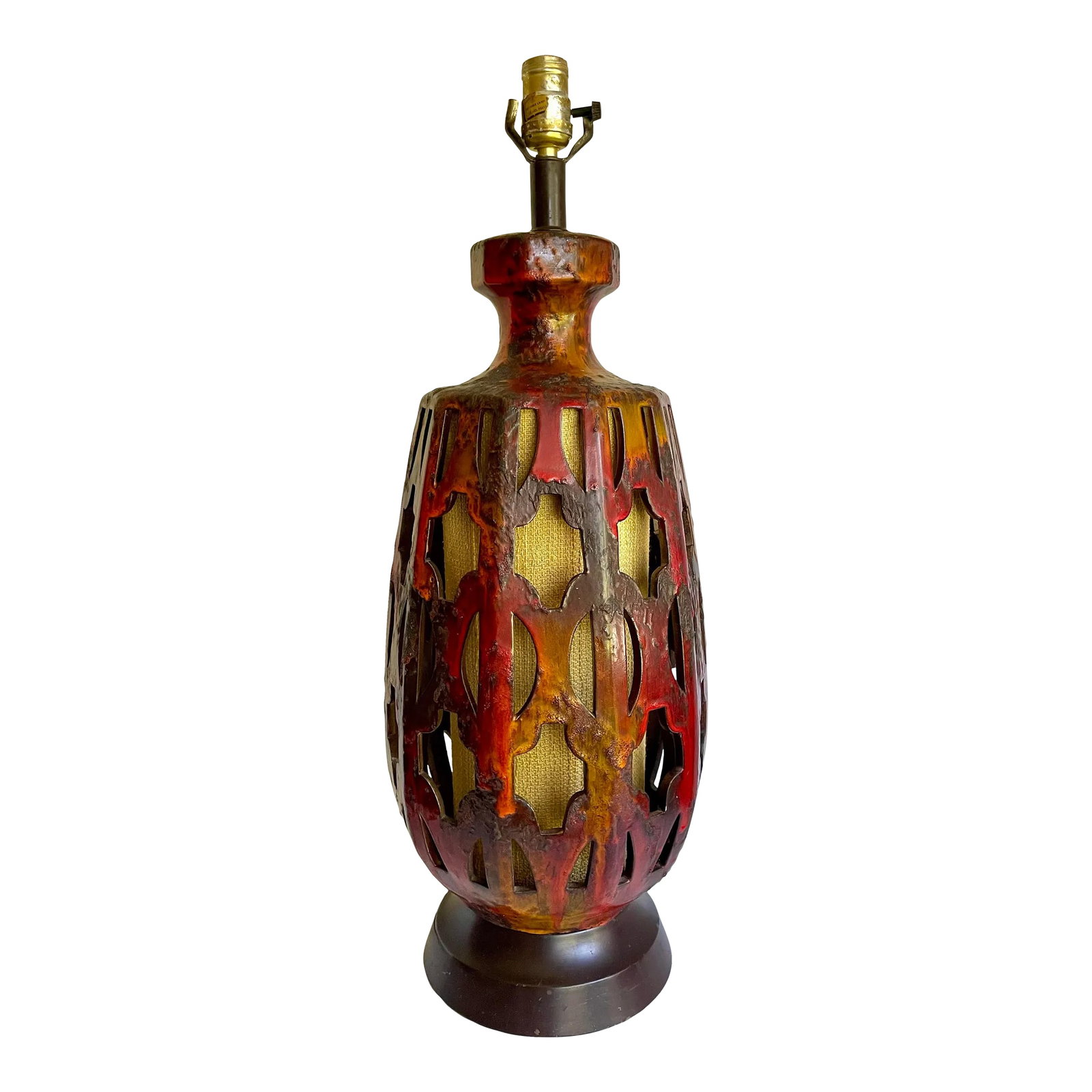 1960s Mid-Century Modern Ceramic Glazed Pottery Lava Table Lamp: Here is a gorgeous table lamp from the mid-century featuring a pierced/cut-out design on a pottery base with an inner textile shade diffuser. This type of lamp is often referred to as a lava lamp as
