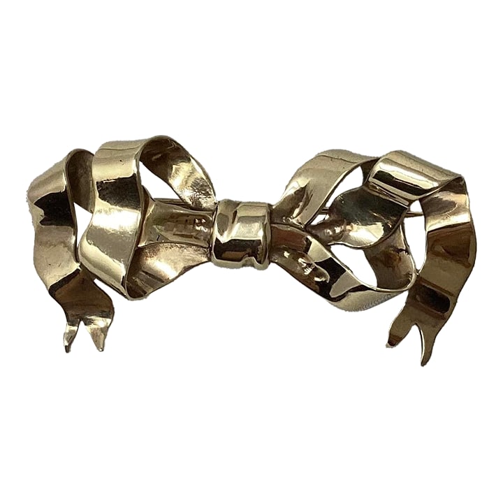 Mid 20th Century 14k Yellow Gold Custom Made Pin in Shape of Bow Tied Ribbon: Artfully tied 14k yellow gold pin in the shape of a ribbon. Tests 14k Condition: Alterations: Original Condition Unaltered Imperfections: Some Imperfections Condition Notes: Excellent condition. It