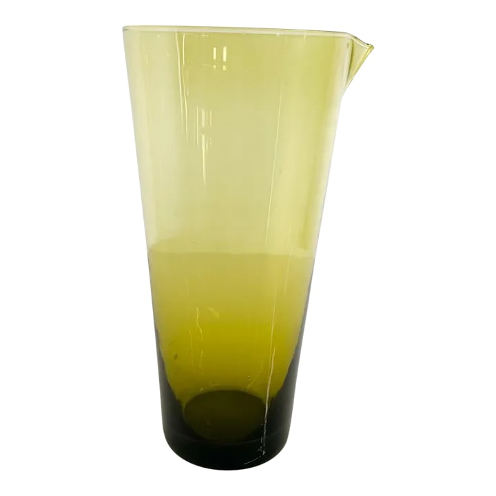 1960s Scandinavian Modern Juice Carafe Green Glass Iittala Finland: AMBIANIC presents 1960s Scandinavian Modern Green Glass Juice Carafe Iittala Finland Unmarked 8 tall x 4 diameter at widest Preowned original vintage condition See our images provided. Condition: