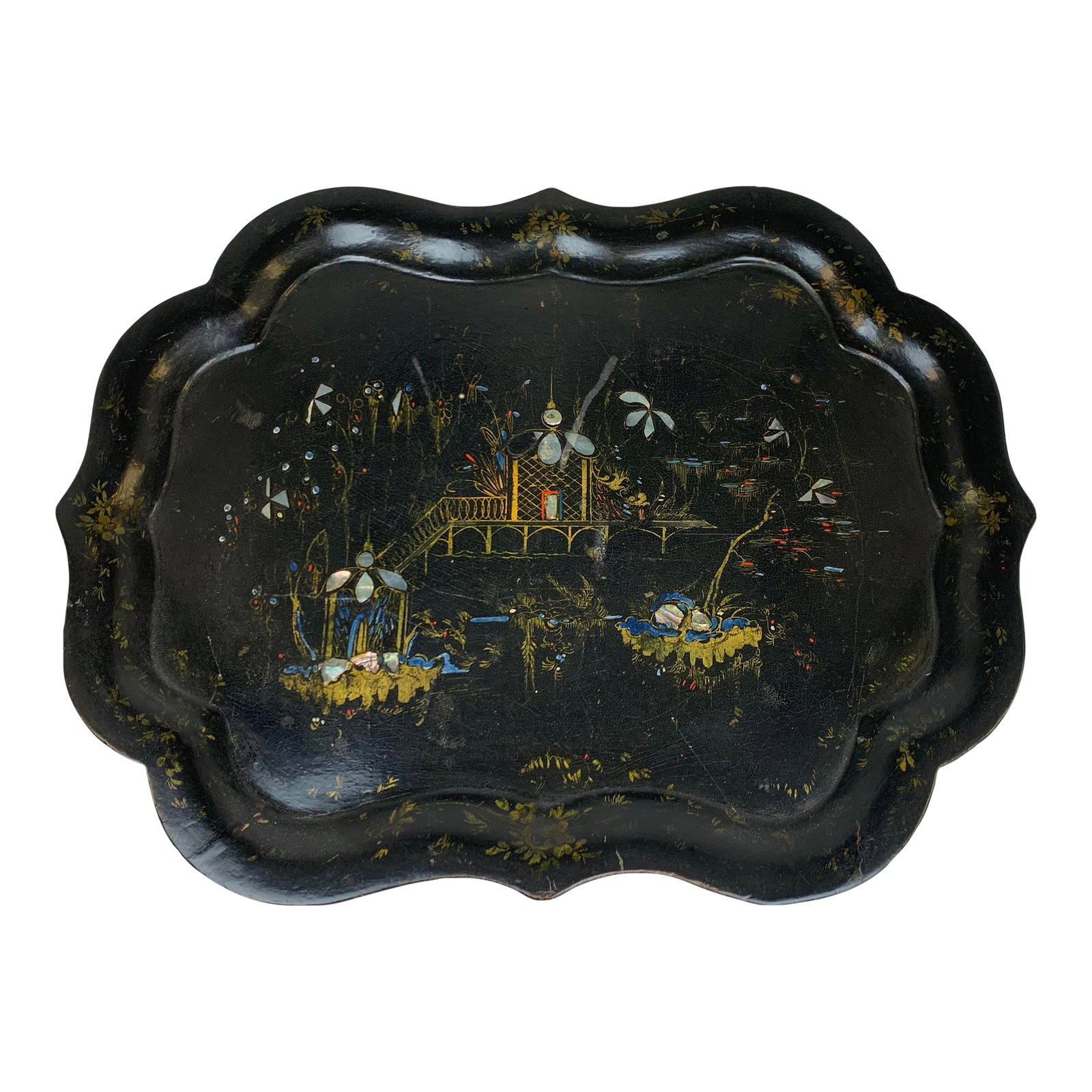 Antique Papier-Mâché Chinoiserie Tray: This antique papier-mâché tray showcases exquisite hand-painted artistry, featuring a tranquil lakeside scene adorned with delicate flowers. Its rich patina and timeless charm make it not on