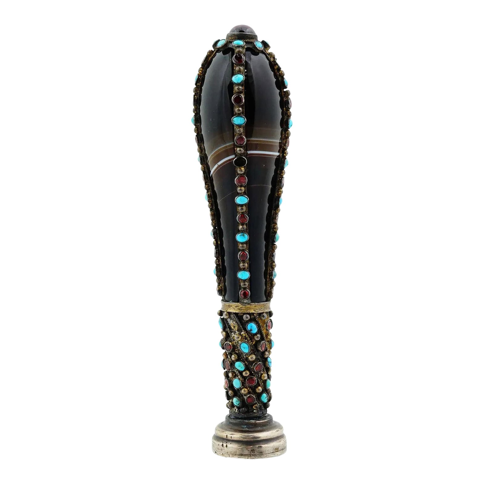 Antique Silver Turquoise and Garnet Mounted Black Agate Seal: A antique gilt silver hand seal with black agate body. The piece is richly embellished with turquoise and garnets. The seal part represents a noble court of arms. Unmarked. Total Weight: 105 grams.