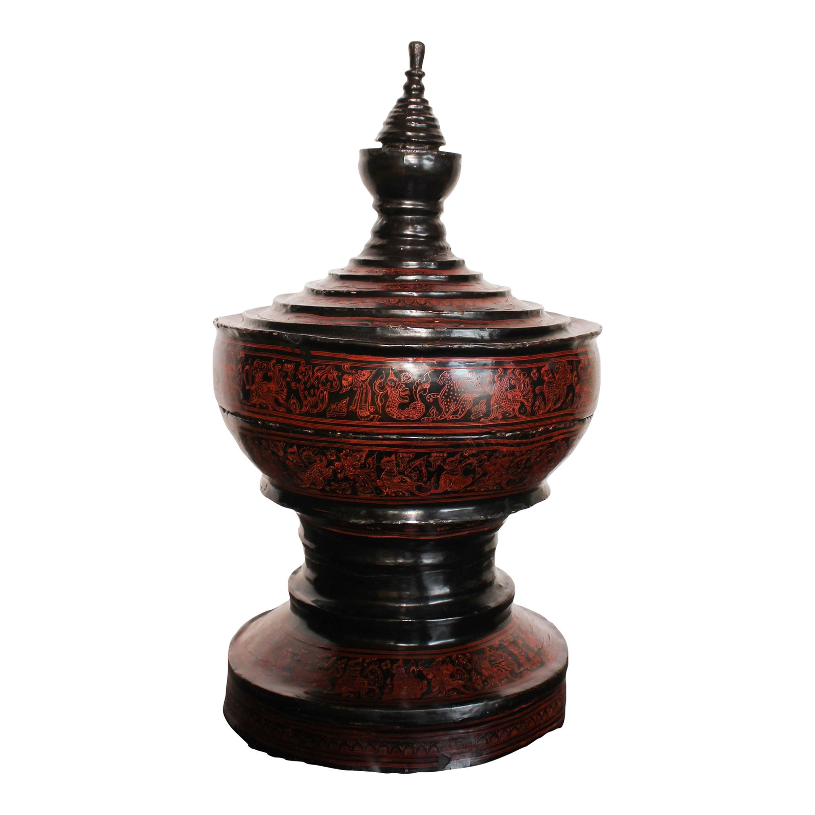 19th Century Black Lacquered Burmese Offering Vessel: This vessel dates to the 19th century, and is in a pagoda style shape, with fauna and decorative patterns finely rendered in red. Traditional Burmese offering vessels ("hsun-ok") were historically