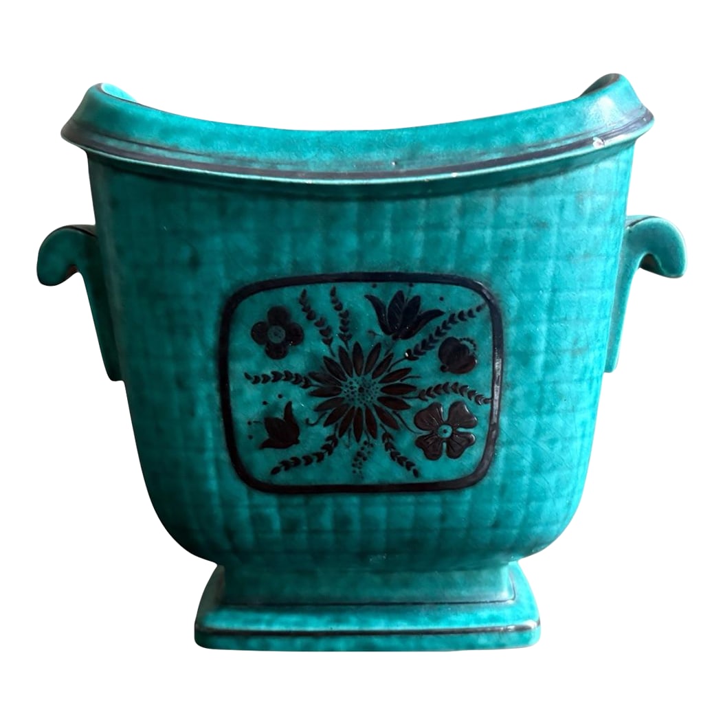 1940s Wilhelm KÃ¥ge for Gustavsberg Floral "Argenta" Teal Stoneware Vase, Sweden: This stunning ceramic turquoise vase has applied designs of flowers and leafs and was designed by Wilhelm KÃ¥ge for Gustavsberg Sweden. Hallmarked on the bottom in the stoneware: