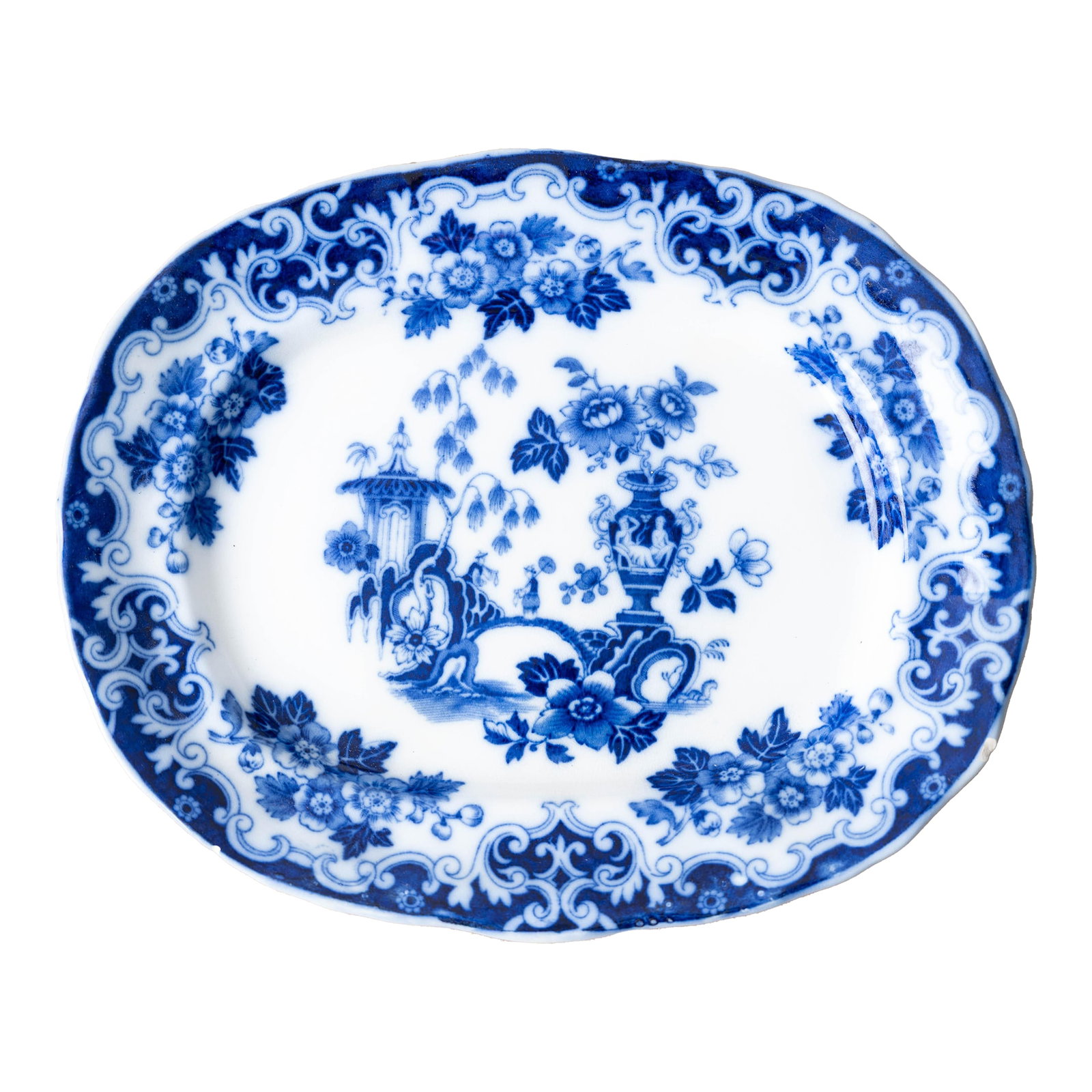 Burgess & Leigh Blue Celeste Chinoiserie Transferware Platter, c.1885: Oval earthenware platter transfer-printed in blue with chinoiserie garden scene of pagoda, flowering urn, and scrolling floral border, c.1885. Burgess & Leigh (B&L) of Burslem, Staffordshire, with