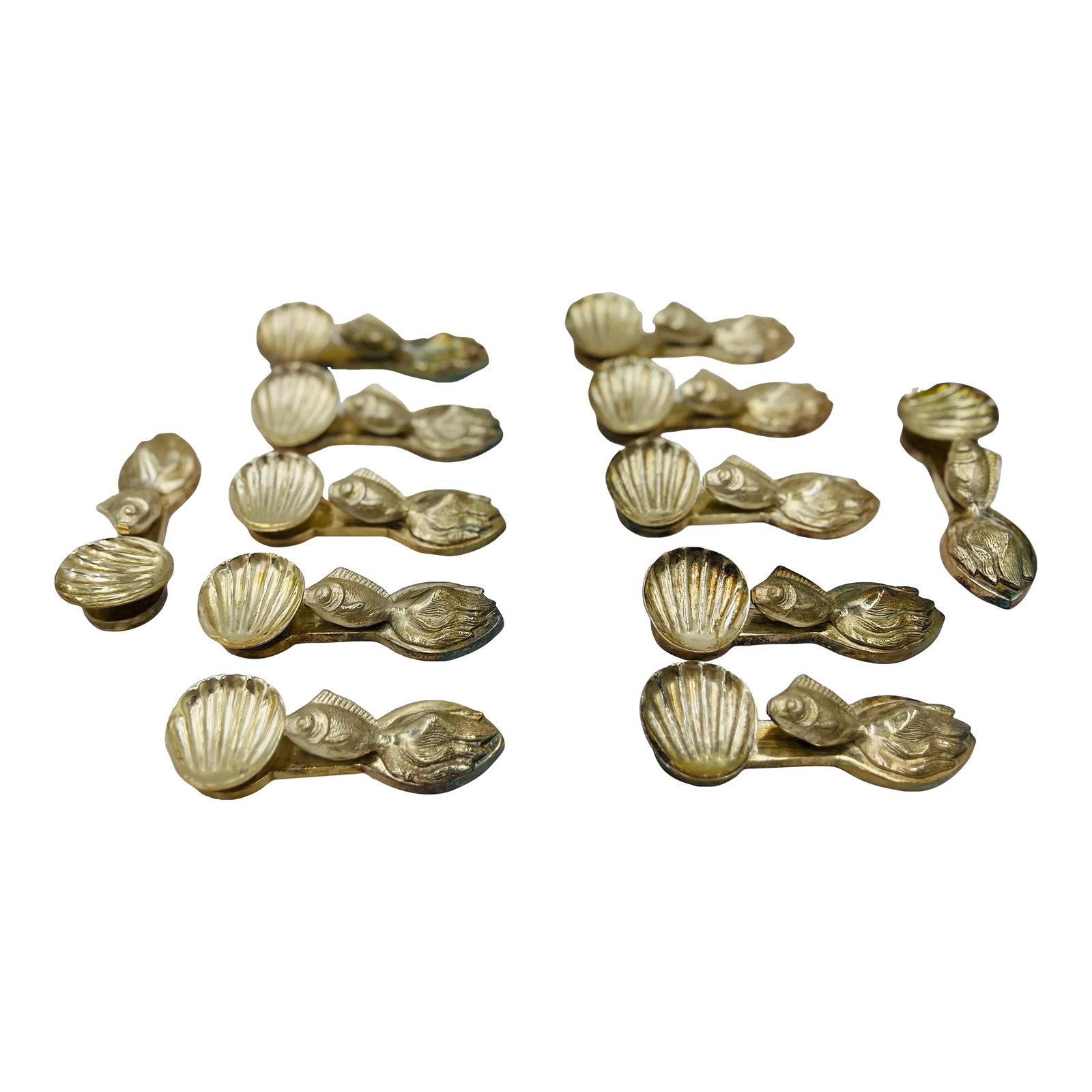 Set of 12, Buccellati Style Italian Silvered Fish / Shell Form Individual Salts: A set of 12 unique individual salt cellars. Each reminiscent of the famous Buccellati silver factory in Italy. They each have a goldfish laying flat across the body and a half shell cellar on the othe