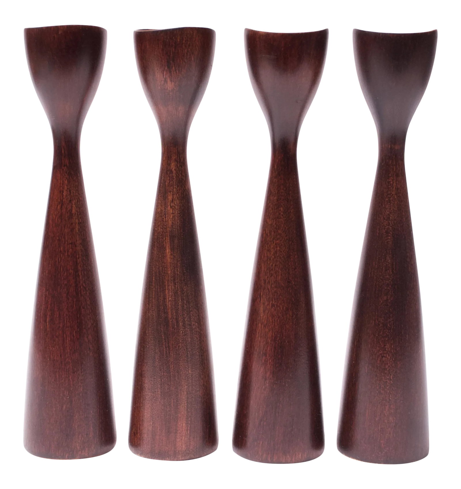 Set of Four Sculptural American Modern Stained Maple Candlesticks: This set of four American Modern Candlesticks with an elegant, sculptural form has been newly refinished, and the maple has been stained with a rich mahogany finish. Very nice condition with some