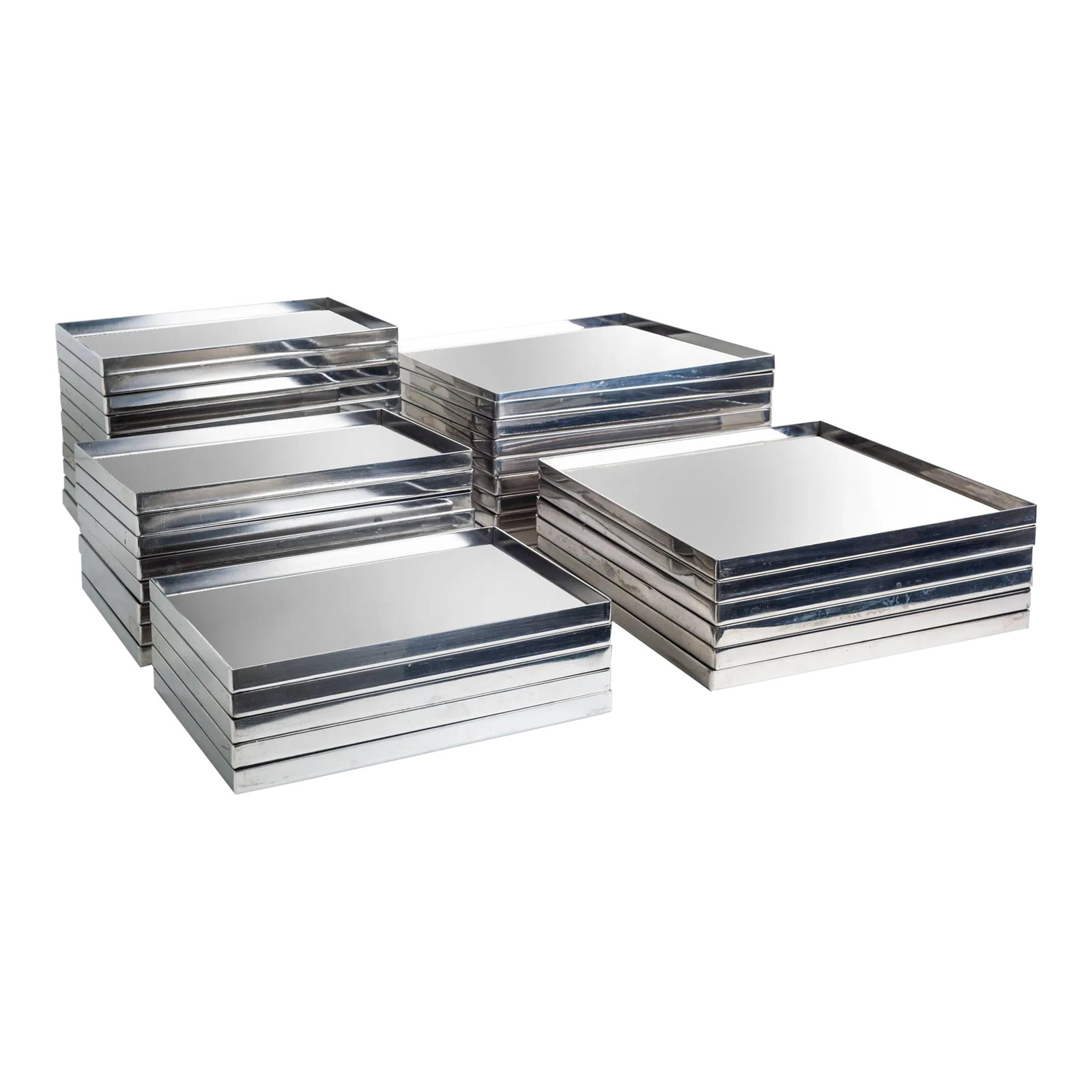 Phillipe Starck Custom Stainless Steel Dishes, Set of Thirty-Eight: Phillips Starck Custom Stainless Steel Dishes set of Thirty-Eight, from The Clift Hotel, San Francisco, California. Two sizes: Both 1/2" high Smaller 23" in total 9" x 6" Larger 15 in total 9.50" x