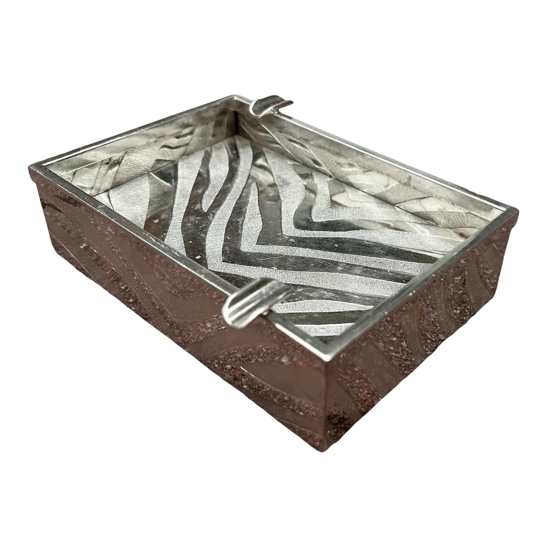 Mid Century Modern Incised Zebra Print Pattern Italian Silver Ashtray, Marked Made in Italy: Ashtray in a strong square form with an incised zebra print pattern. Featuring two cigarette rests. Strongly resembles vintage Gucci home accessories. This substantial and texture-heavy ashtray adds a