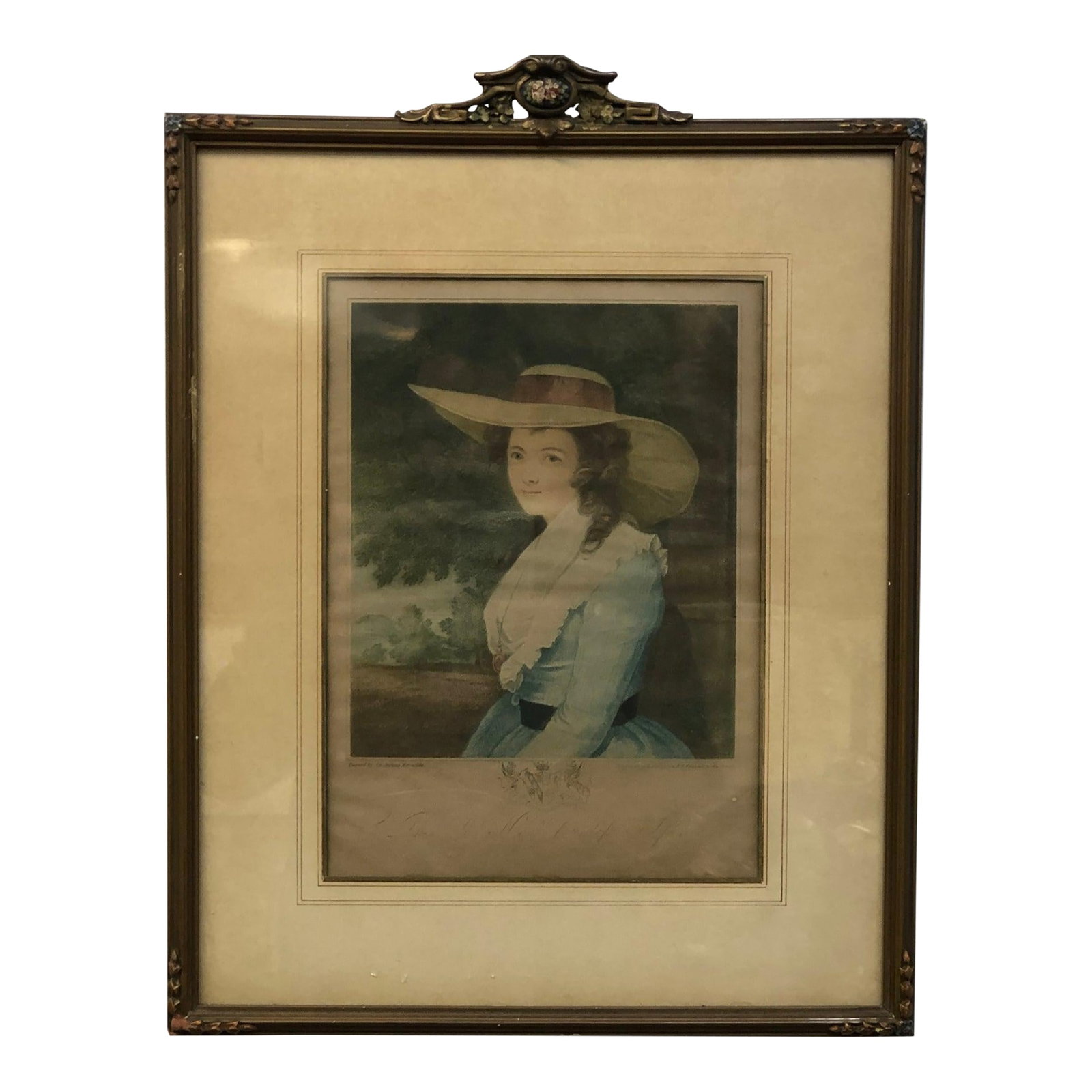 Elegance in the Countryside - Antique Portrait, Print of an Original by Sir Joshua Reynolds: This antique portrait print of an original painting by Sir Joshua Reynolds captures the grace and elegance of 18th-century portraiture. The subject, a poised young woman dressed in soft blue and