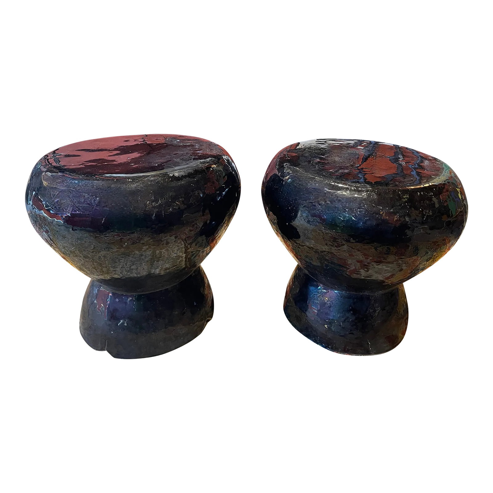 Pair of Black Ceramic Outdoor Stools by Made Goods: Here is a very solid pair of black ceramic stools that can be used indoors or outdoors. The glossy surface gives them a nice brilliance and they are quite comfortable, too! Condition: Alterations:
