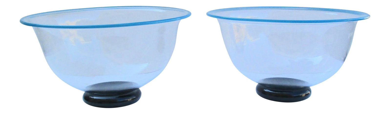 Vintage 1989 Kosta Boda Handblown Bowls - a Pair: Very elegant and fine signed pair of table bowls or desk cachepots, Signed with monogram and dated 1989 to the underside. Pontil marks to center of both. Clear and deep with blue glass rims and