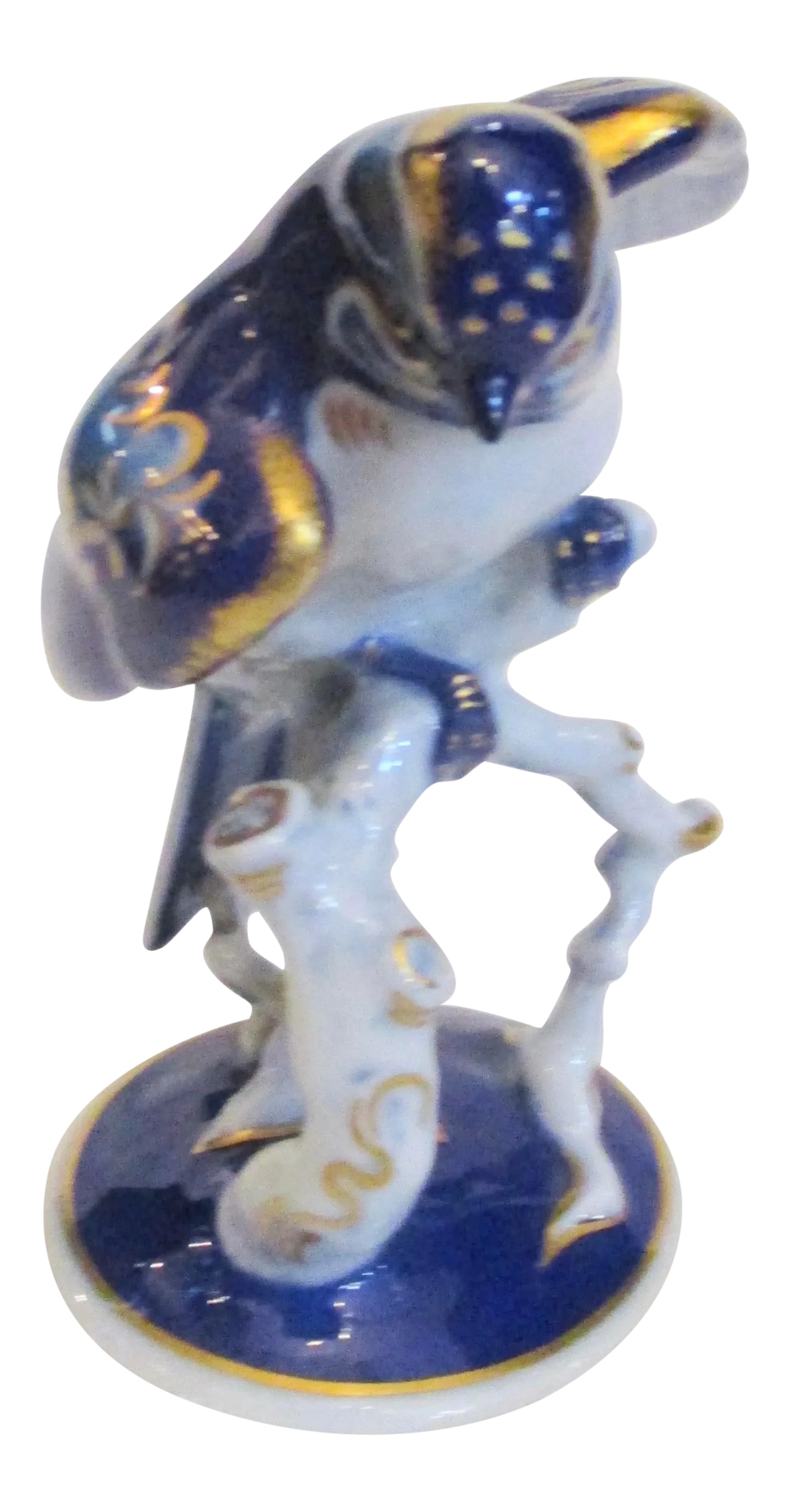 Rosenthal Porcelain Bird Vintage 60s': Rosenthal porcelain bird from the 1960s'.Sweet and bright handpainted cobalt blue and white with gilt decorations. The size 4.2" tall and 4.5" by 3" overall. The condition is very good. no losses.