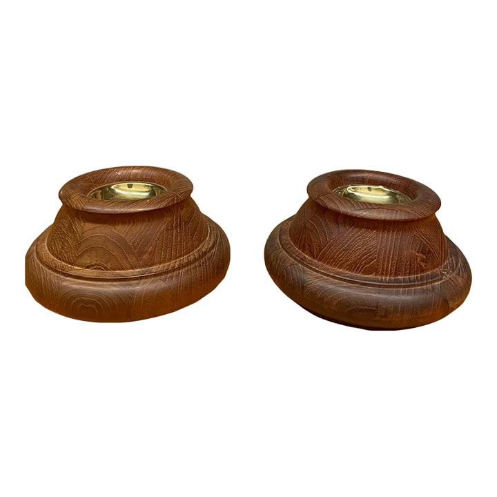Jens Quistgaard for Dansk Staved Teak Candleholders - A Pair: Sculptural staved teak meets polished brass in this iconic Dansk pair, a warm, mid-century accent that's as functional as it is collectible. This pair of sculptural staved teak and brass