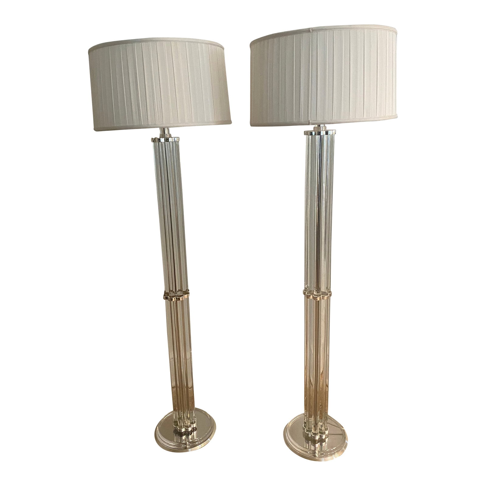 Heavy Pair of Hollywood Regency Crystal and Silver Metal Floor Lamps -a Pair: Pair of elegant heavy luxurious mid-century modern style floor lamps with a timeless modern look composed of solid crystal and lacquered silver metal with references to Art Deco style. The center