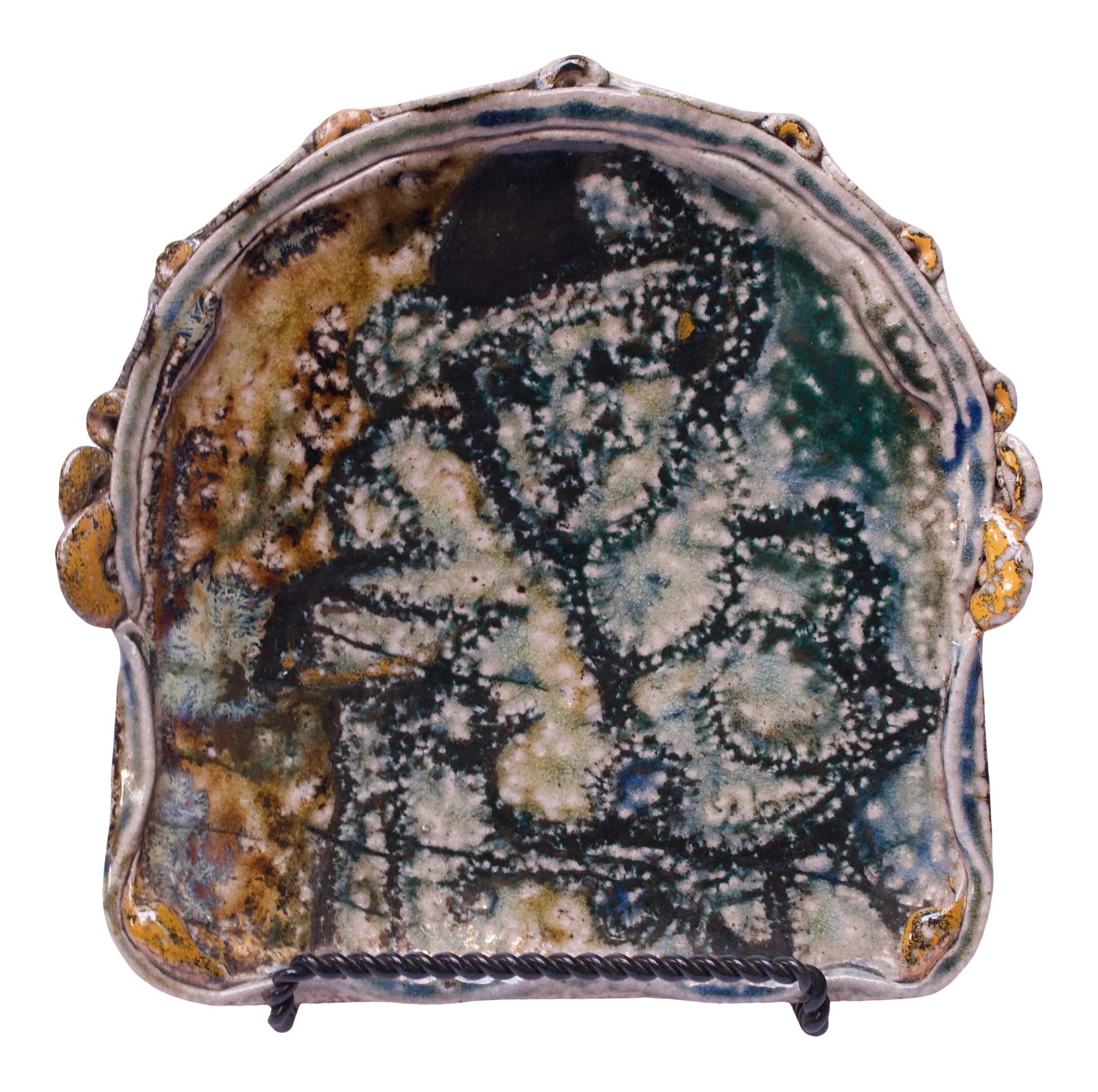 Studio Stoneware Slab Signed Pollack 1973: Stoneware slab / decorative plate with of an attractive palette of brown, green and navy with a mottled pattern throughout. Attached fragments in ochre and mustard adorn the sides. Signed "Pollack