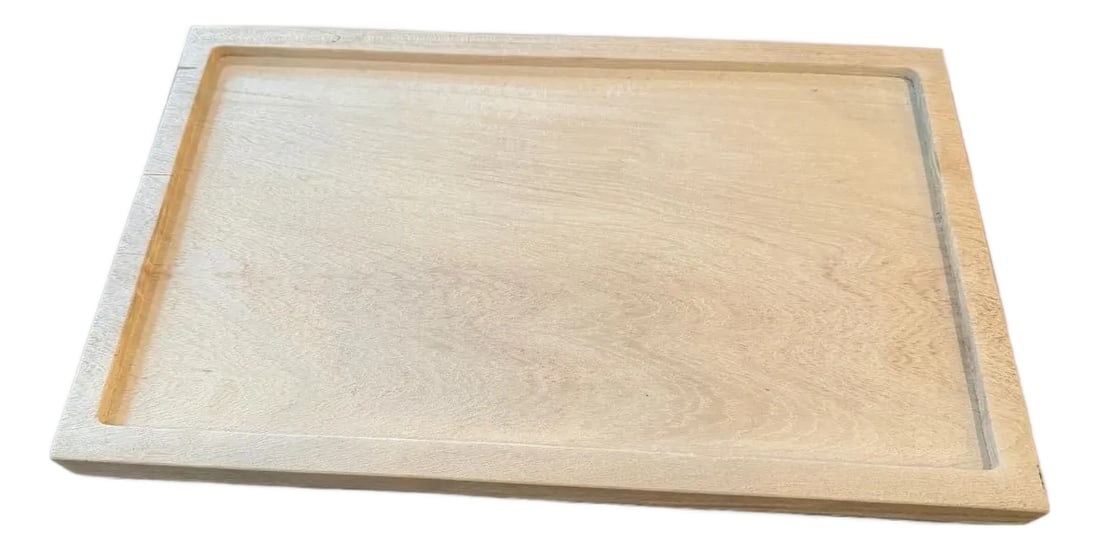 Andrianna Shamaris Minimalist St Barts Teak Wood Tray: A minimalist teak tray carved from a single piece of teak wood. Bleached and finished with a light white wash revealing the beautiful wood grain. The St. Barts Collection features an exciting line of