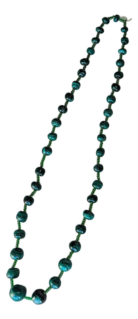 Vintage Graduating Malachite Alternating With Glass Beads Necklace, 26": Graduated Malachite with glass beads 26" total legth. Purchased in the 70's from the Zaire (now the Congo). It is hand strung uniquely without a clasp. Condition: Alterations: Original Design