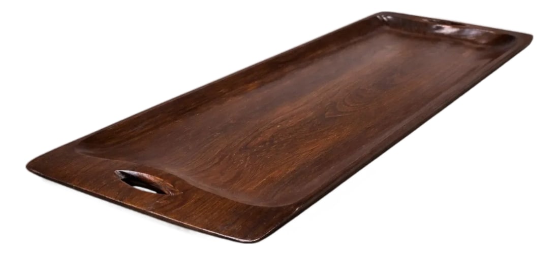 Brazilian Mid-Century Modern Tray in Rosewood, Jean Gillon, 1960s: Handcrafted in Brazil in the 1960s, this elongated serving tray reflects the disciplined minimalism that characterized the country's modern design movement during its period of international reach.