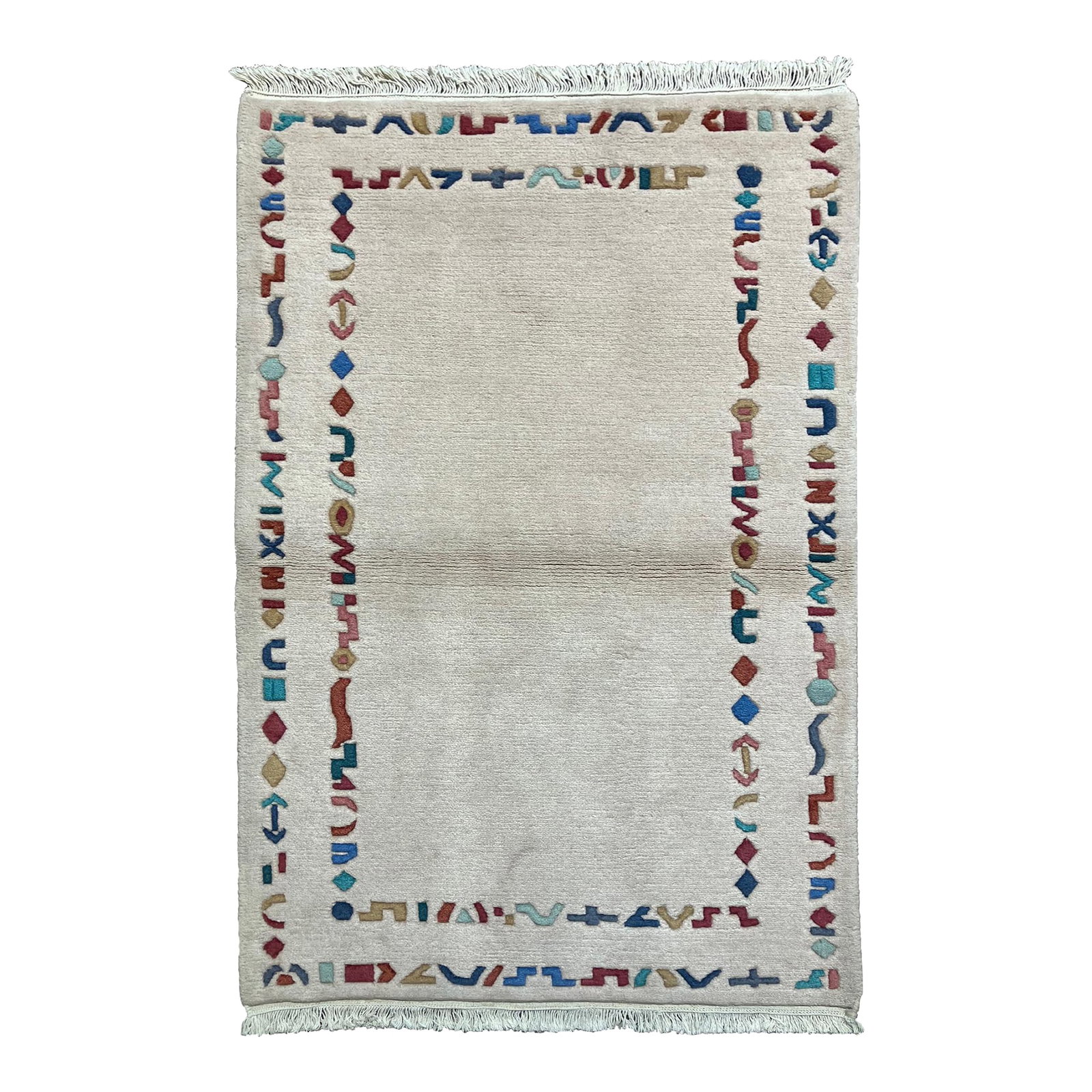 Modern Hand-Knotted Nepal Rug 3'2" X 5'3": Hand-knotted Nepal wool rug featuring a minimal ivory field framed by a decorative border of abstract geometric motifs. The design highlights a clean central space with colorful, stylized elements in 