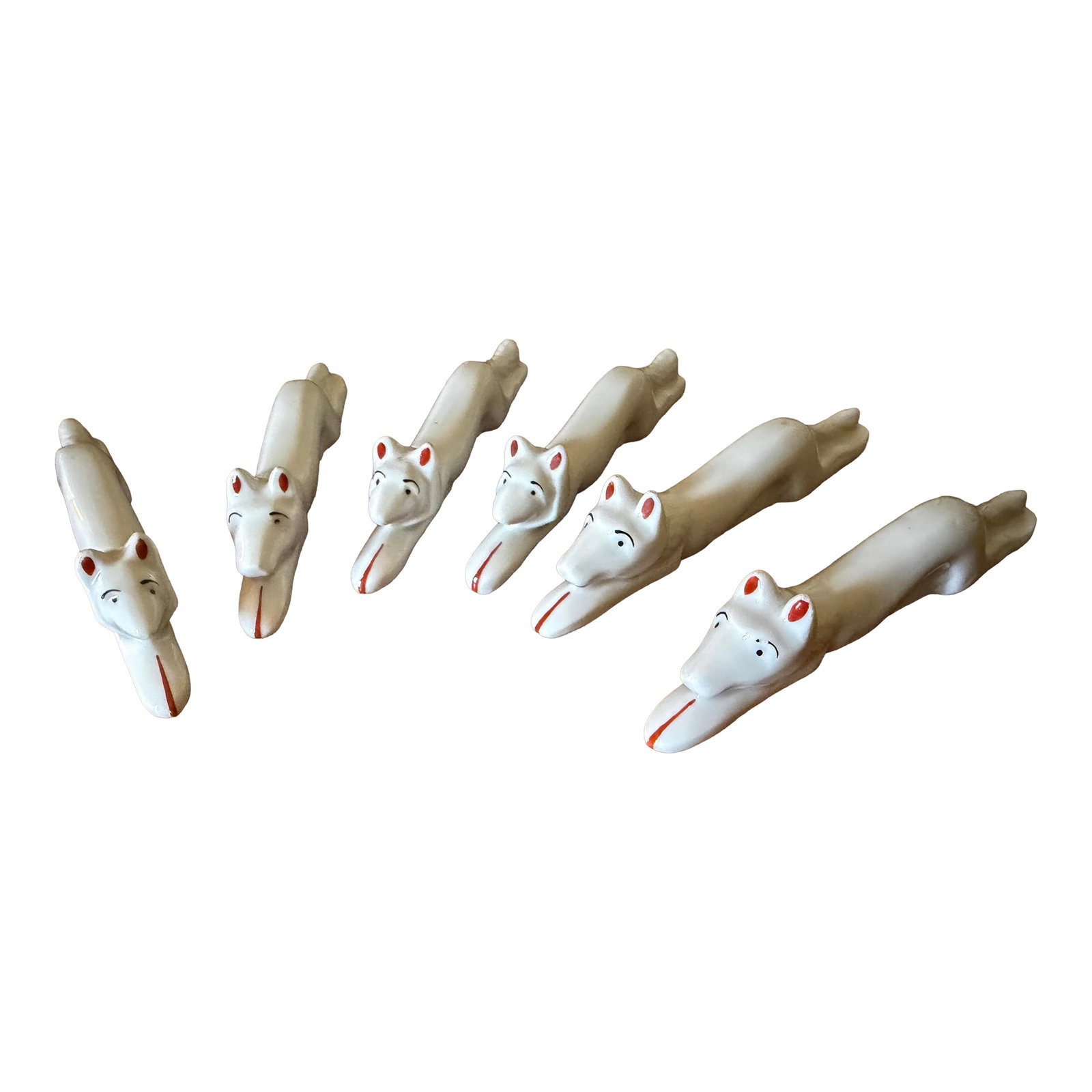 Vintage Art Deco Pfeffer Gotha Porcelain Animal/Fox Knife Rests, Set of 6: Vintage set of Pfeffer Gotha white porcelain knife rests in immaculate condition, sourced in Paris. Made in the 1930's-1940's in Germany, these rests usually depicted dogs, foxes, cats and rabbits. A