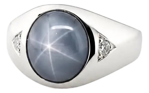 Late 20th Century 14Star Sapphire Ring, Size 8.5: 14k white gold ring with an approximately 7.00 carat gray-blue star sapphire and two round diamonds weighing approximately 0.15 carats, 10.2 grams, size 8.5 (sizable). Condition: Alterations: