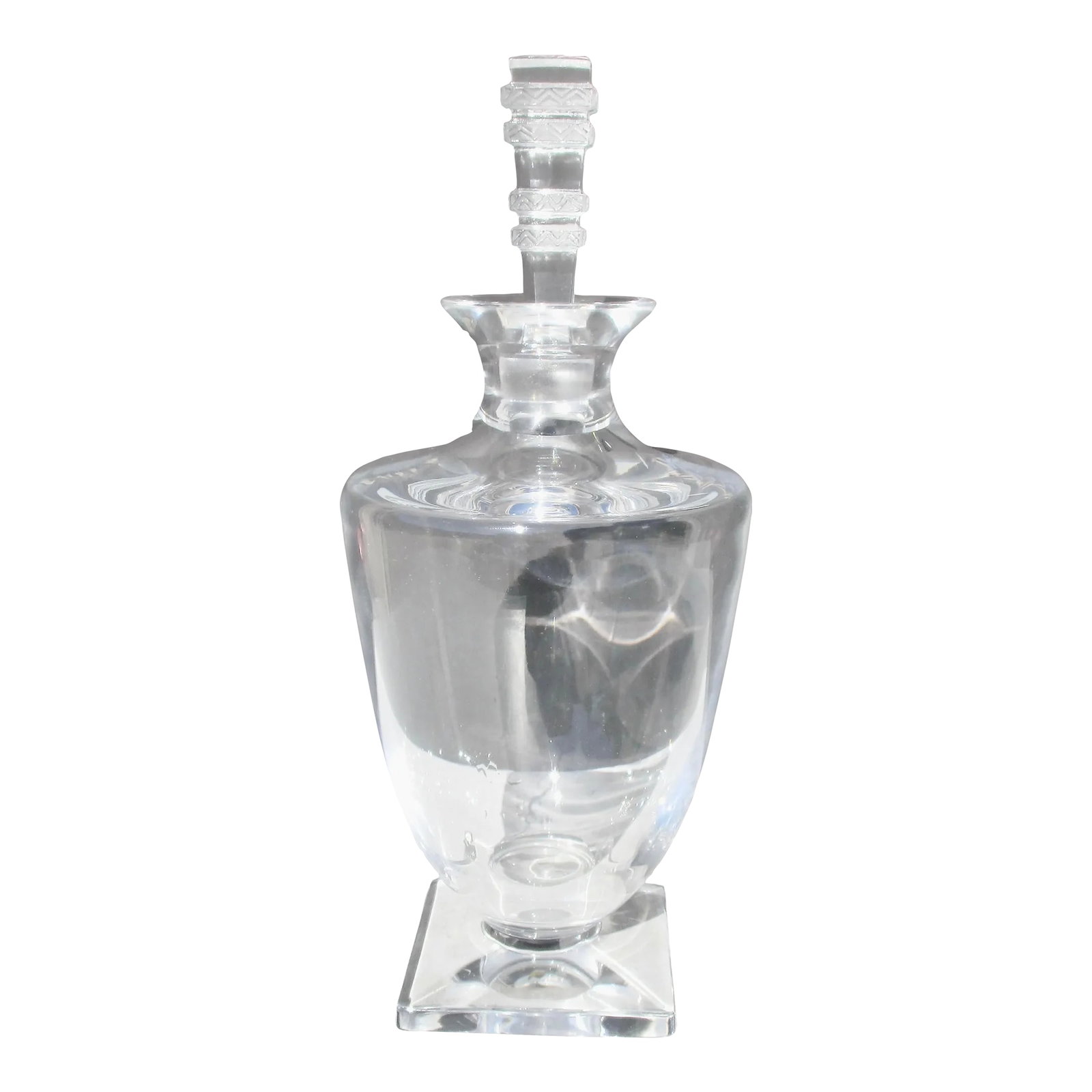 Lalique Argos Crystal Decanter Vintage 20th Century: Vintage crystal decanter by Lalique France. ARGOS, beautiful square footed classic urn shape with a tall square stopper with Art Deco chevron detail. The decanter is marked Lalique France to the
