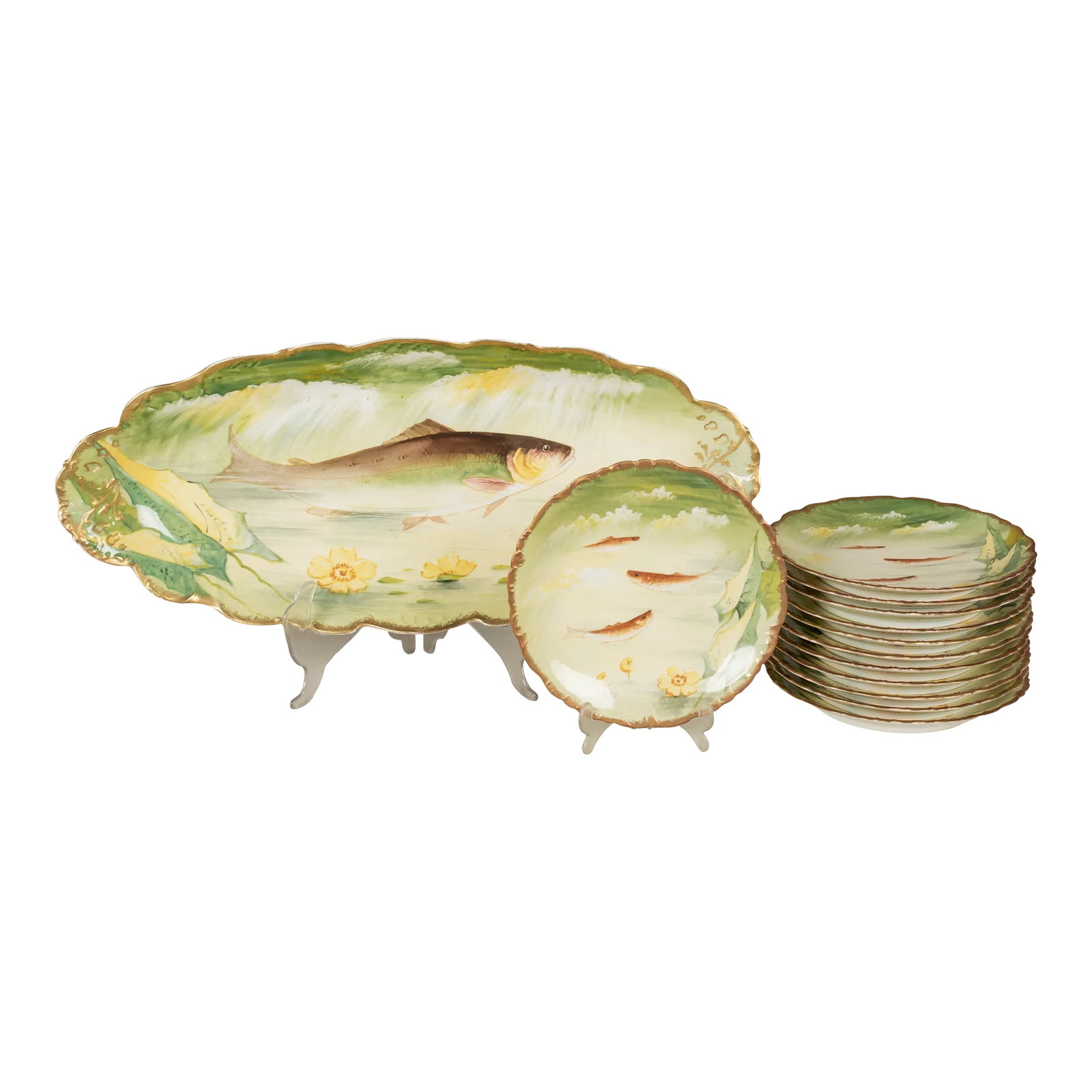 Limoges Fish Platter Set With 12 Plates: An early 20th century French Limoges porcelain fish platter and 12 plates, each hand-painted in green and yellow with gilt edge. Mark to underside: Elite Works Limoges France. (Red print indicating