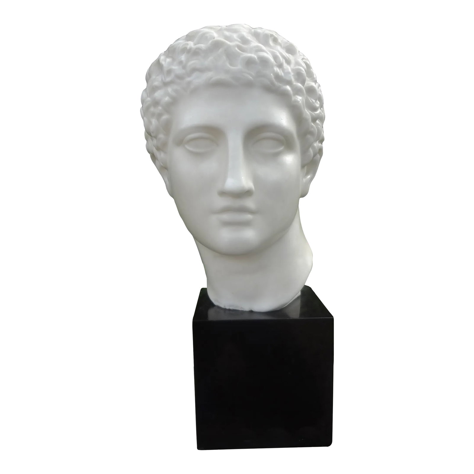 French Porcelain Bust of a Classical Male: French Porcelain Bust Of A Classical Male. This vintage French porcelain bust sculpture is mounted on a marble base and dates to the 1940's. This gorgeous antique bust would look great on a pedestal, 
