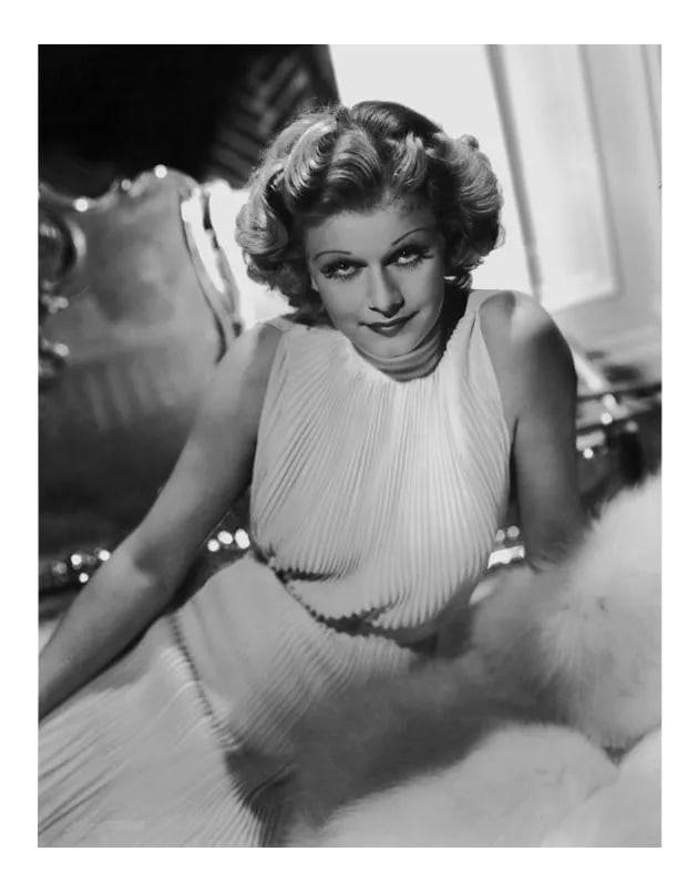 Jean Harlow Circa 1936: Jean Harlow, circa 1936. Photo by Ted Allan. 11" x 14" silver gelatin print. Printed later under the direct supervision of Sid Avery and signed on verso by Sid Avery. #03 of an open edition.