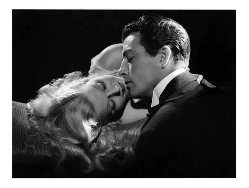 Jean Harlow and Robert Taylor 1937: Jean Harlow and Robert Taylor kissing, 1937 Photo by Ted Allan. 11" x 14" silver gelatin print. Posthumous modern print authenticated by Sid Avery. Open edition. Condition: Imperfections: No